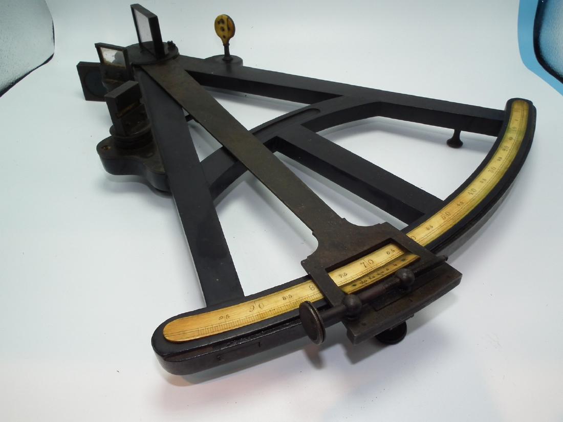 ANTIQUE OCTANT: Early English octant or quadrant in ebony wood and brass with bone scales signed Owens? Liverpool. 16 x 13 inches.