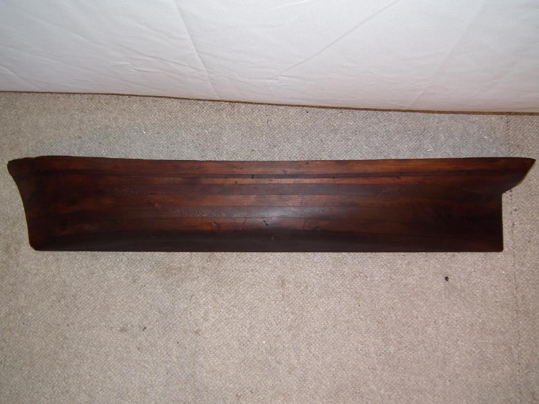 ANTIQUE SHIPS HALF HULL: 19th century laminated wood ships half hull model. 45 in long x 6.5 high x 5 inches deep.