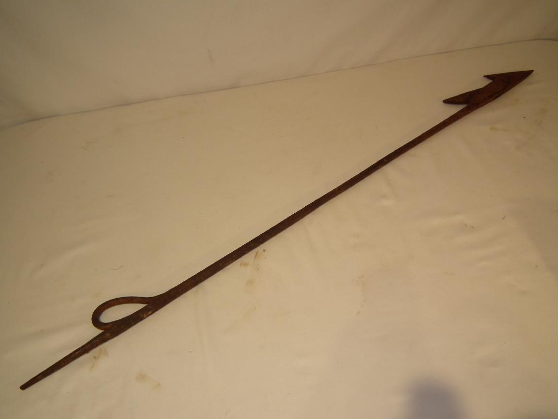 ANTIQUE TEMPLE TOGGLE HARPOON: 19th century Temple toggle iron harpoon with gun ring, traces red paint. 38.75 inches long