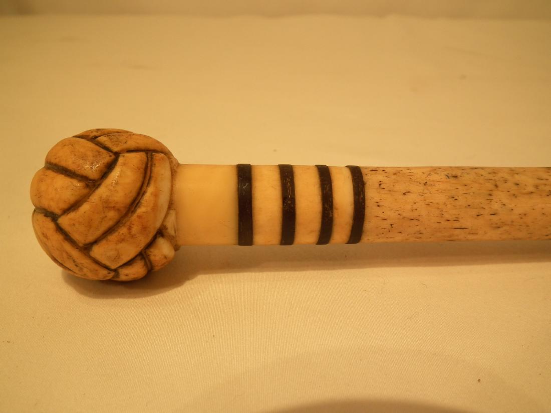 19th C. WHALE BONE CANE - MONKEY FIST: 19th century whale bone cane with monkey fist handle, 4 baleen stripes, smooth tapered shaft. No ferrule. 34 inches long, fist is 1.5 in diameter.