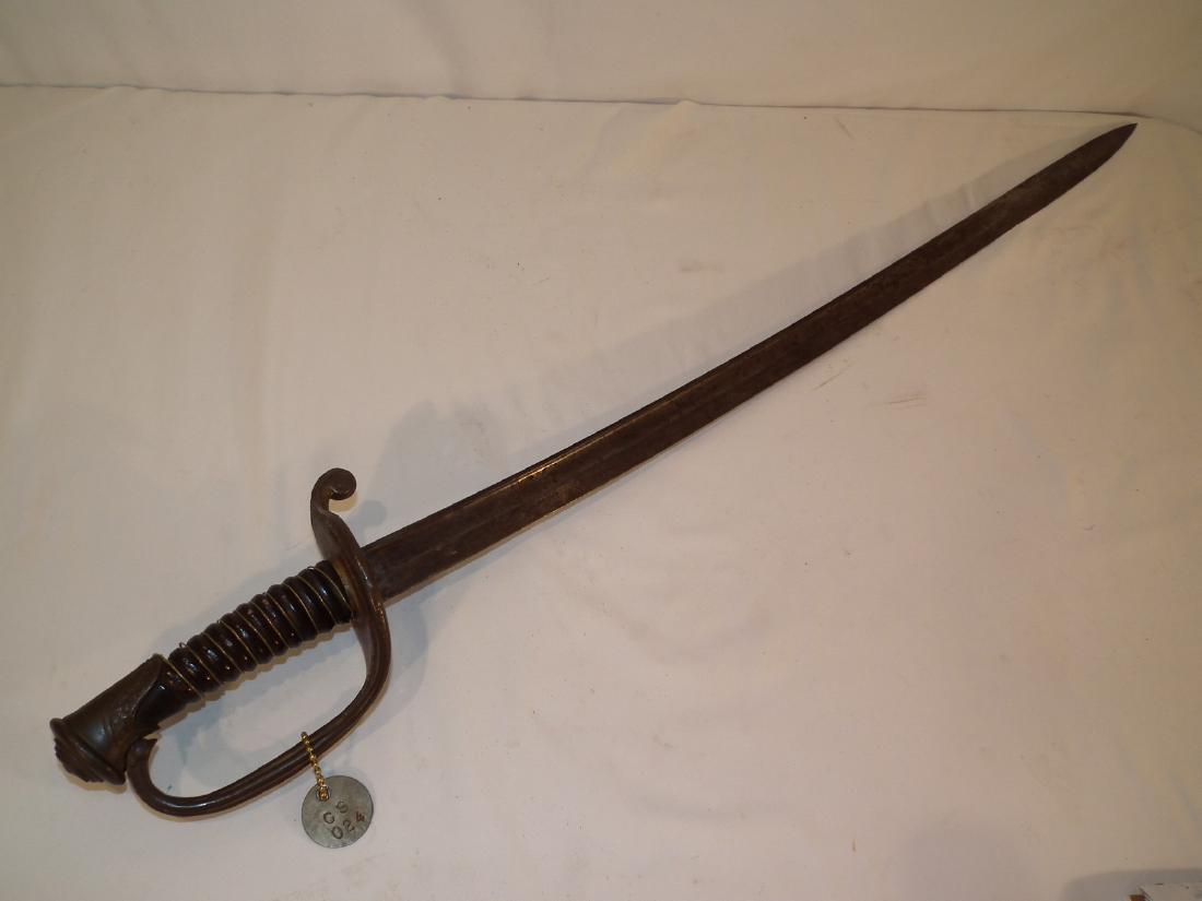 CIVIL WAR CONFEDERATE SWORD: Civil War sword with gilt and pierced hand guard, possibly French made for the Confederate States. 36.25 inches, blade 30.25 inches. Has a CS ring tag from a collection.