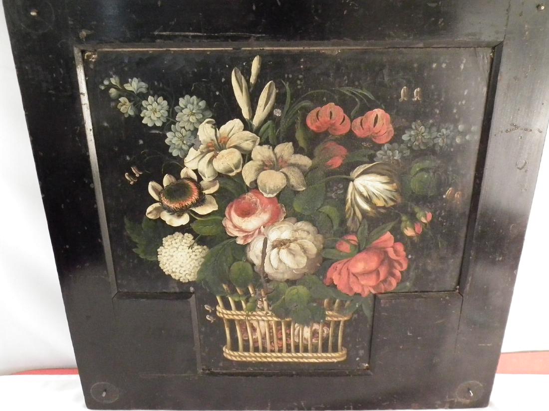 ANTIQUE FLOWER PAINTING ON TIN: Antique still life painting of flowers in a basket, on tin panel, mounted in wide ebonized wood frame. 26.5 in square panel. Unsigned, some flaking to tin, missing corner elements.