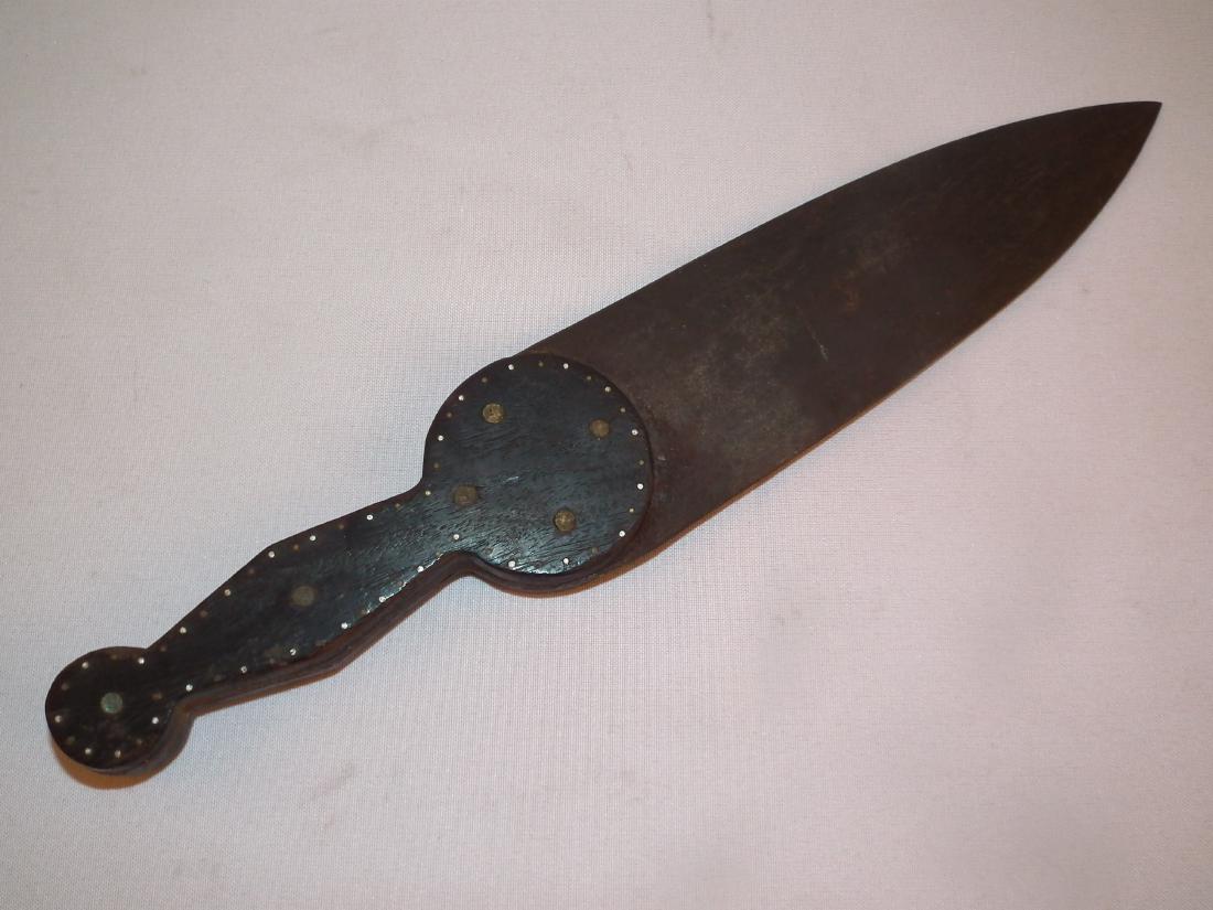 INDIAN DAG KNIFE: Old Native American dag knife with shaped and brass studded wooden handle. Overall length 13 inches.