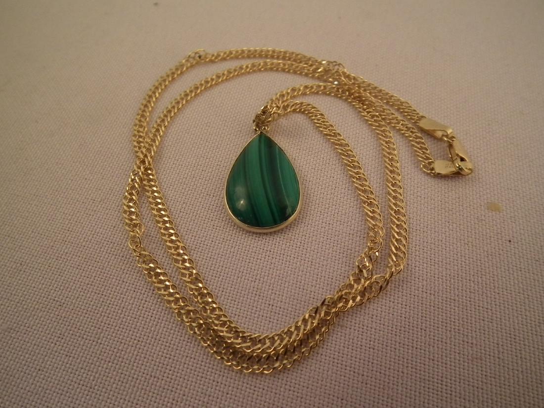 14K NECKLACE MALACHITE PENDANT: 14k gold necklace with one inch polished malachite teardrop pendant. 17 inches long. 5 dwt.