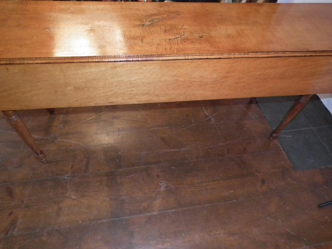 MAPLE FARM TABLE: 19th century long, narrow tiger maple drop leaf farm or harvest table with turned legs, top is 78 inches long x 18 wide, leaves 9 inches deep. 29 inches tall.
