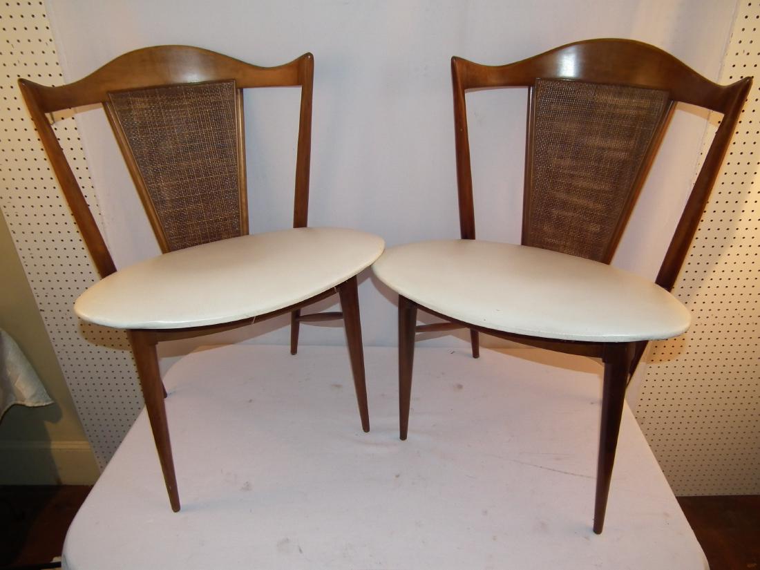 PR. MID CENTURY CHAIRS: Pair of mid-century walnut double caned chairs. 33 high x 23 inches wide.