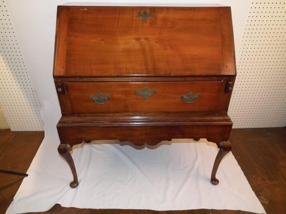 QA DESK ON FRAME: 18th century Queen Anne maple slant lid desk on frame, pad feet, one drawer. Shaped skirt and pegged construction with 5 interior drawers. 40 high x 36 wide x 19.5 inches deep. Some stains on interior