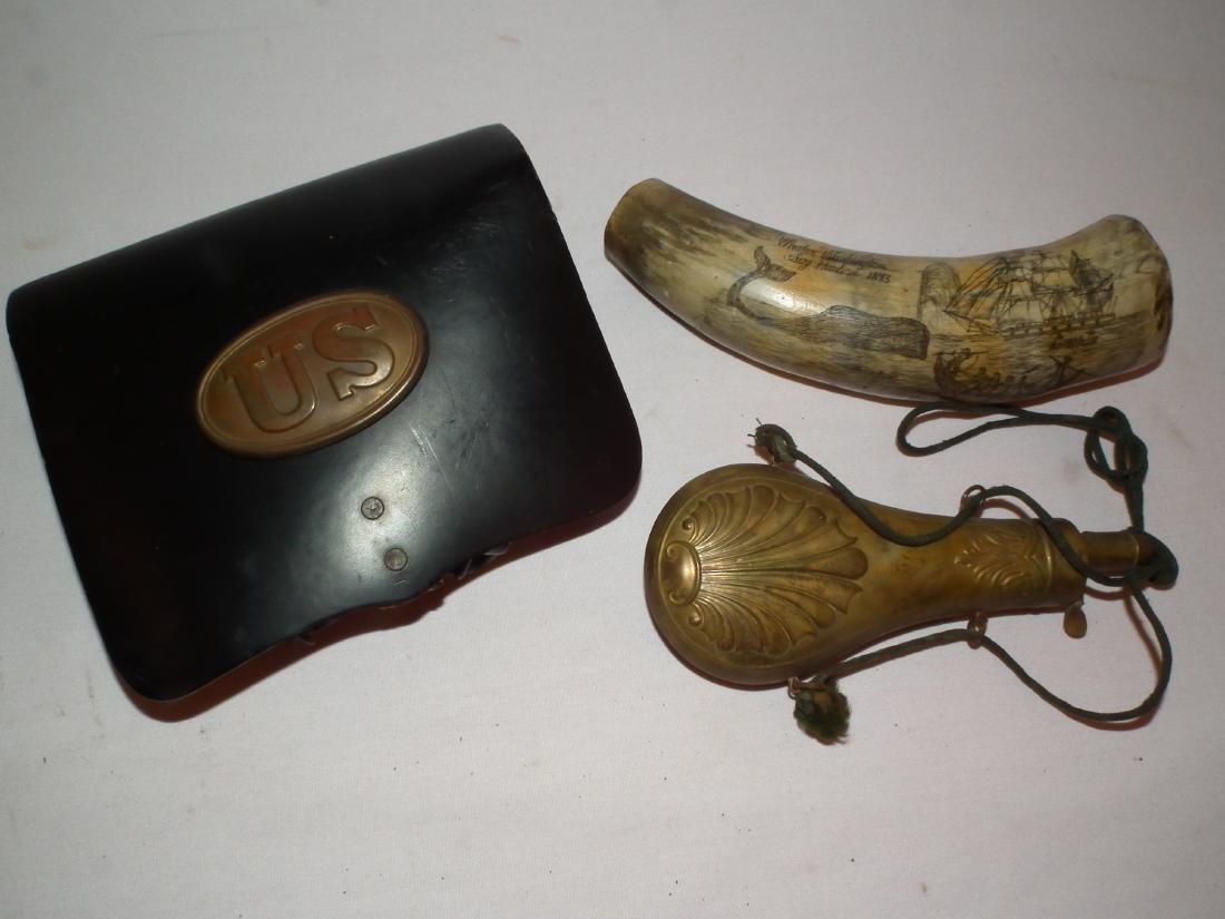 2 POWDERHORNS & POUCH: Lot of military items including an 8 inch antique brass embossed powderhorn; vintage scrimshaw powderhorn with WHALER WASHINGTON SAG HARBOR 1843 inscription; and an old replica US Civil War leather an