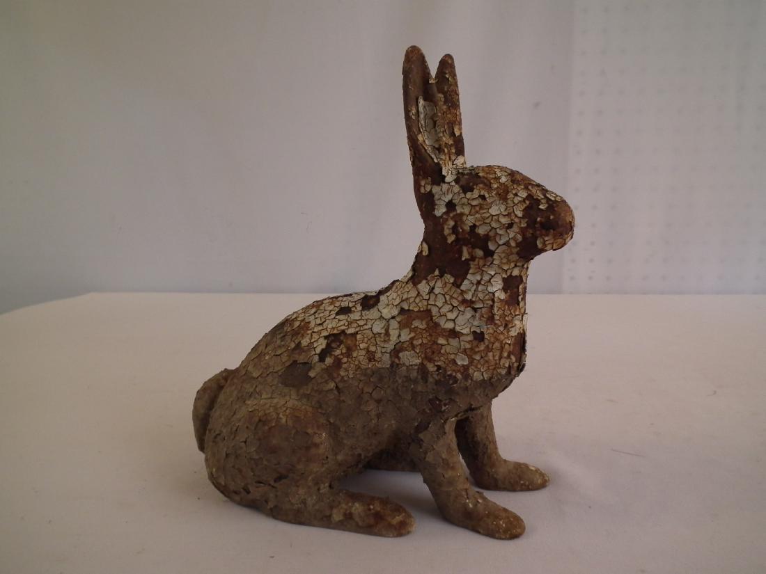 IRON RABBIT DOORSTOP: Heavy, solid iron antique doorstop in form of a rabbit. Chipping, rusty. 12 high x 10 wide.