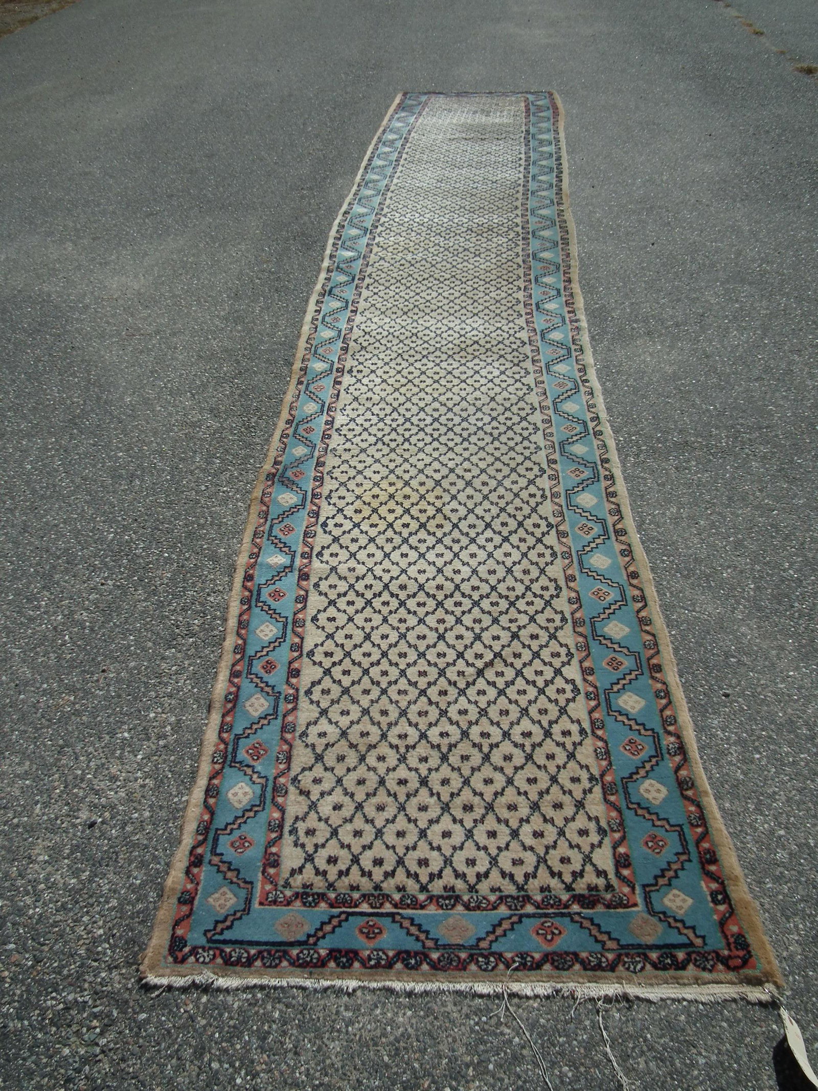 ANTIQUE 20 FT RUNNER: An antique 20 foot Hamadan runner in camel hair and pale blue colors, 3 ft 2 inches wide. VG condition.