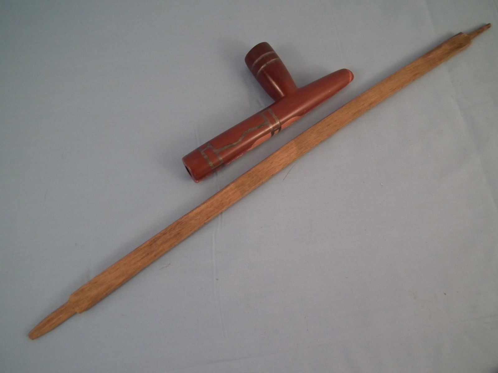 CATLANITE PIPE CA 1870: Antique carved Native American 9" pipe bowl in catlinite with 26 inch wood pipe stem. Pipe identified - Ca 1870 Historic Period, No. 275, Ex. JH.