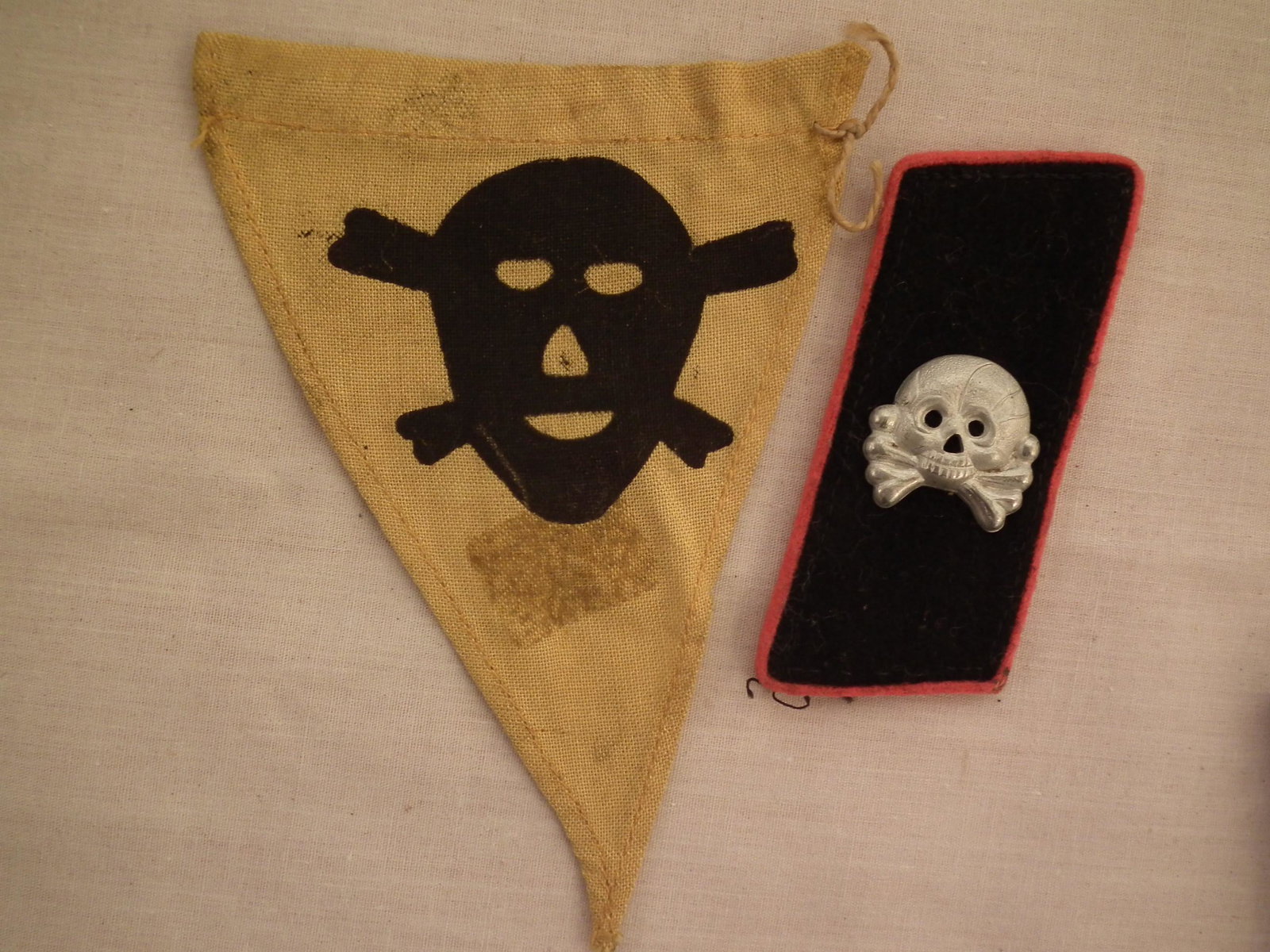DEATHS HEAD PENNANT & PATCH: German WWII SS Death's Head metal 1 inch pin on collar tab and miniature Death's 4.5 in pennant (possibly a gas or minefield flag).