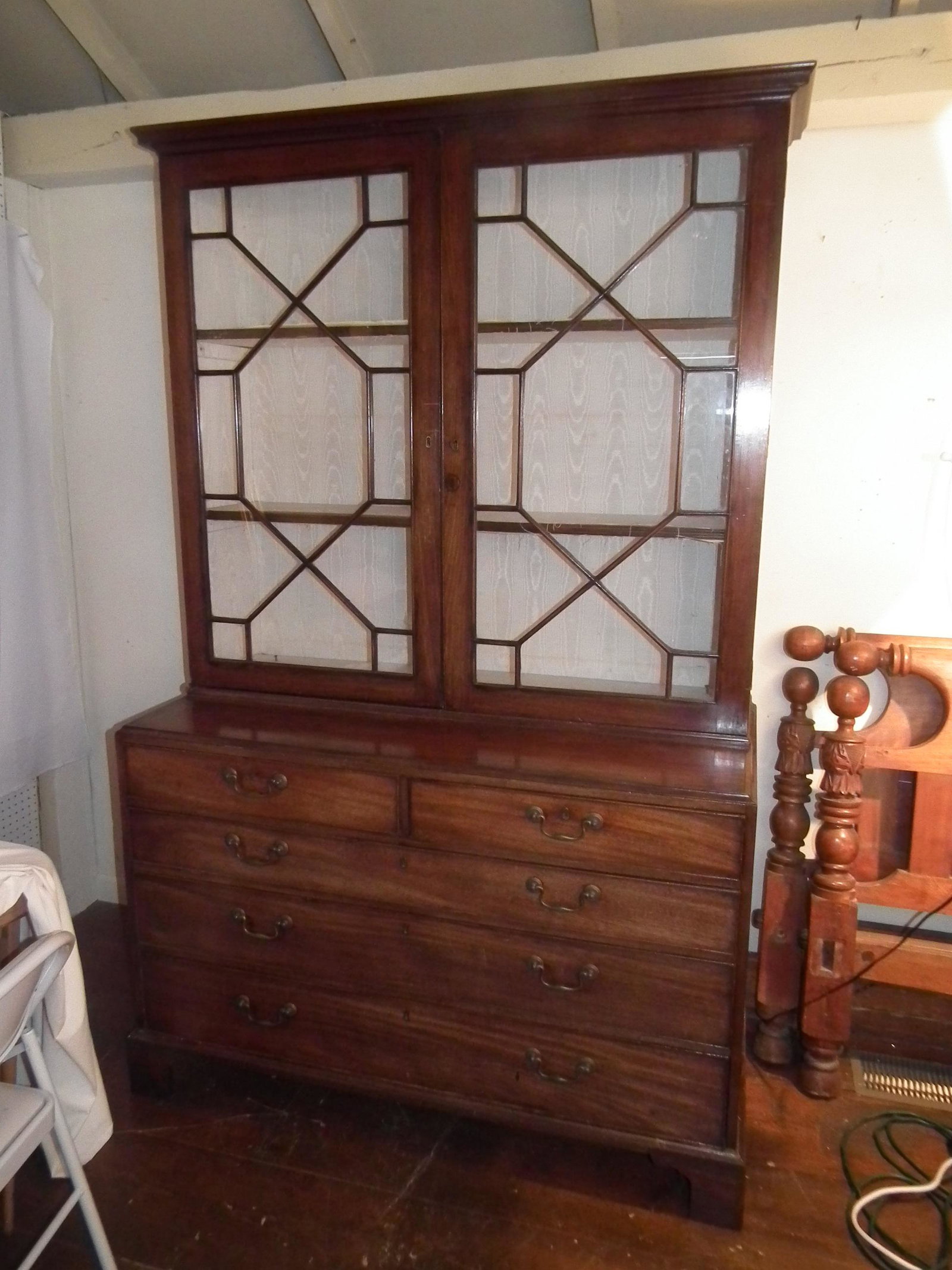 ANTIQUE GEORGIAN BREAKFRONT: Period Georgian mahogany breakfront with double glazed doors and 5 drawers. 83 in high x 51 w x 23 deep. Circa early 1800's.