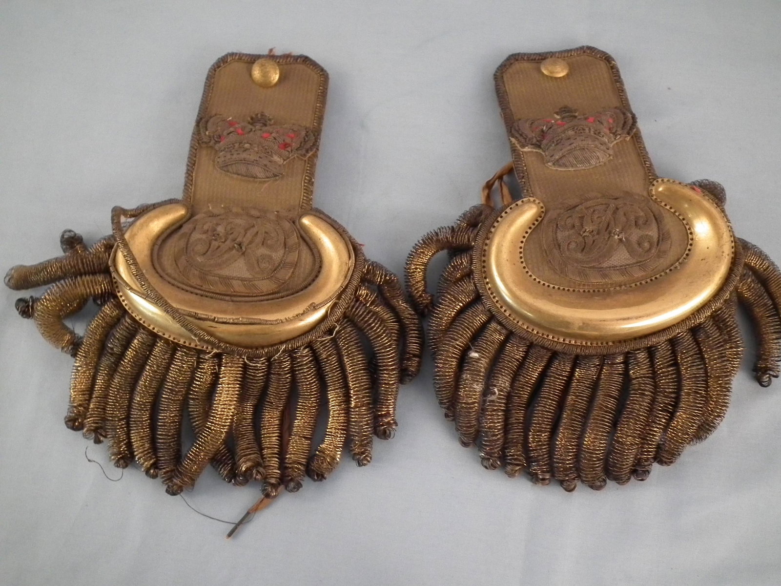 PAIR ANTIQUE ENGLISH EPAULETS: Pair of 19th century English epaulets with fancy gold thread designs, crown and ARRACAN 42.