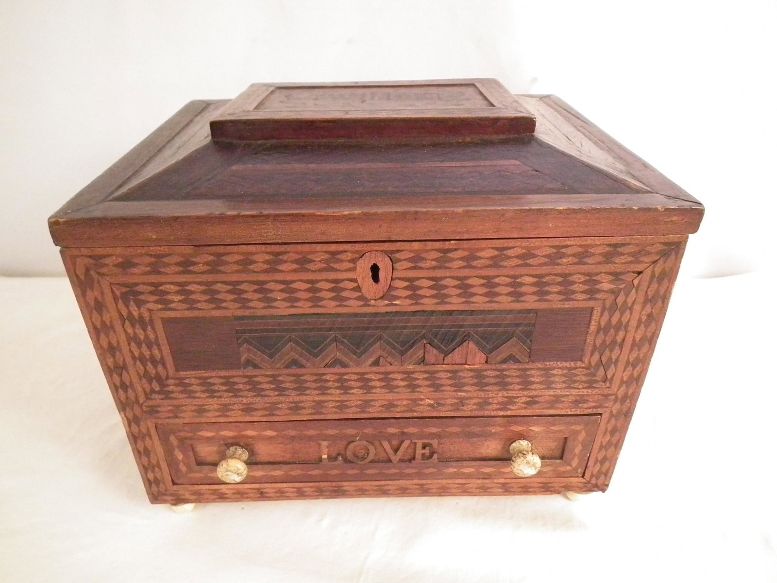 1880 TWILIGHT SHIP BOX: 19th century sailor made wooden ship's document box with whale bone knobs, LOVE on drawer and TWILIGHT on cover (possibly ship's name). Dated 1880. 10 x 9 x 8 inches.