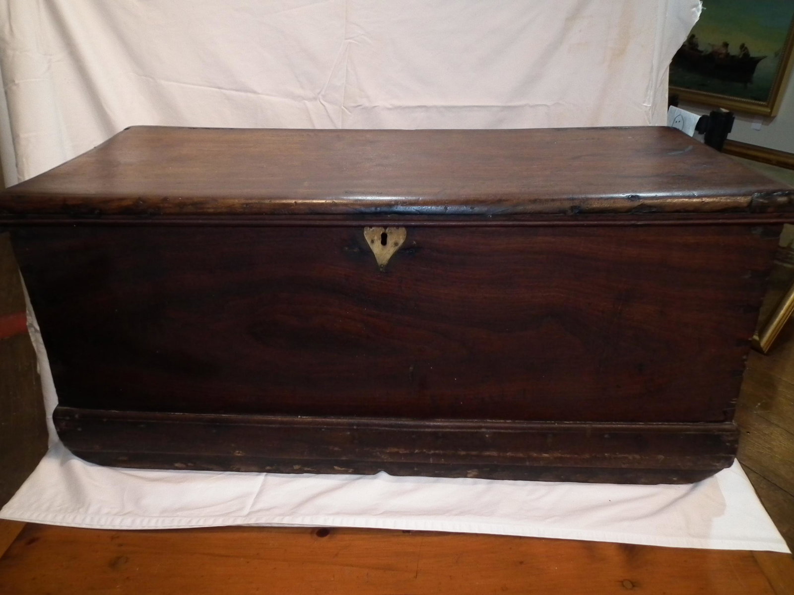 PENN. CANTED CHEST CA 1820: 19th century canted walnut lift top trunk with dovetailed construction, brass handles, canted sides, interior name and decoration with small drawers. Attributed Pennsylvania. Has bone heart escutcheon