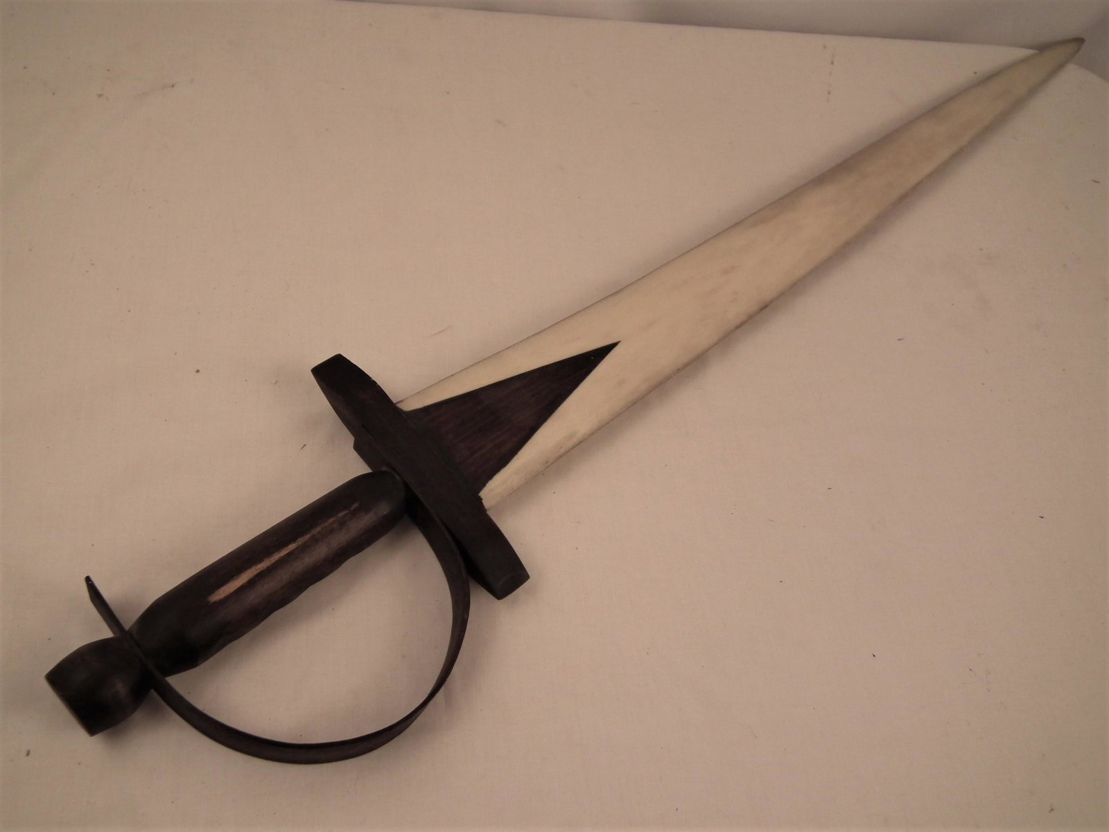 SWORDFISH BILL SWORD: Old swordfish bill mounted as a sword with wooden handle. 43.5 inches long.