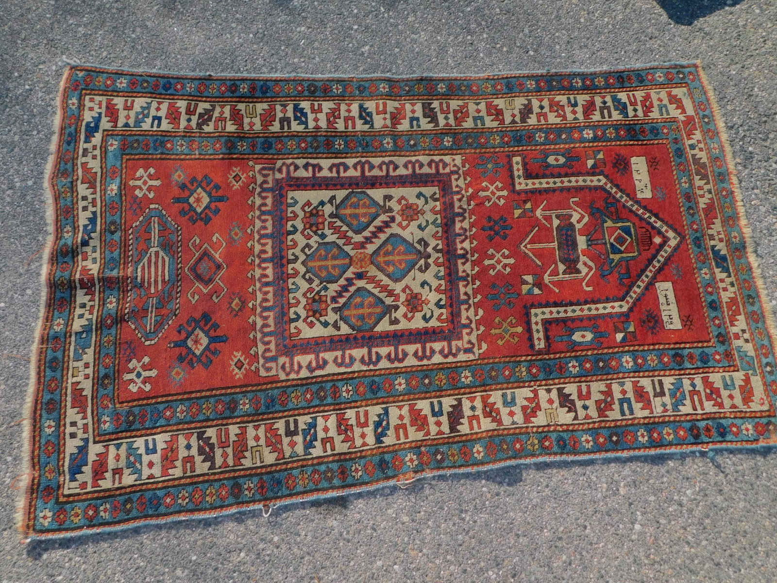 ANTIQUE SHIRVAN PRAYER RUG: Antique Shirvan prayer rug with signature, 3 ft 2 x 4 ft 10 inches, good condition.