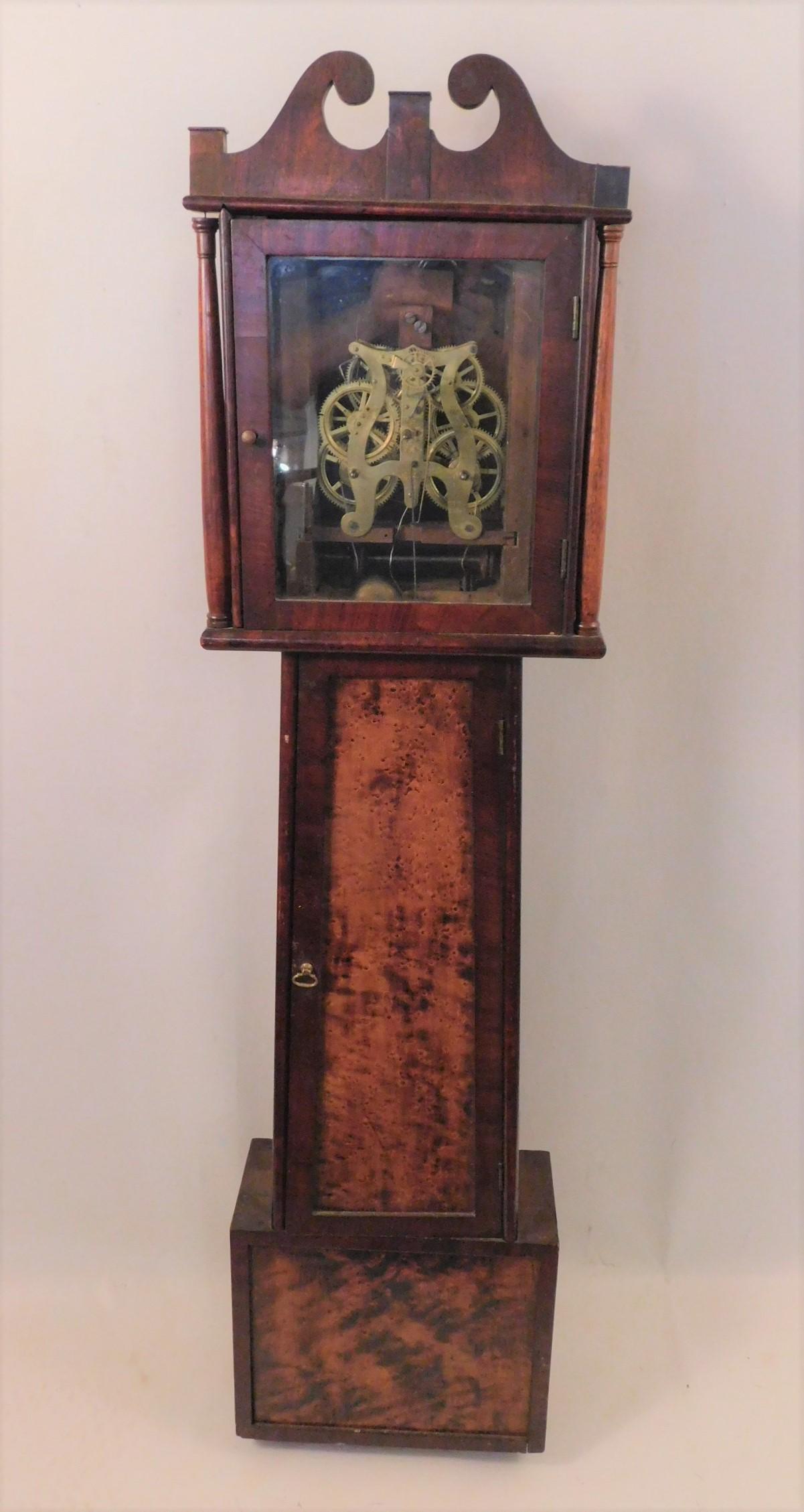 SETH THOMAS LARGE WALL CLOCK: Large birdseye maple and mahogany cased wall regulator clock with brass Seth Thomas of Thomaston Conn. movement (missing dial plate). Size: 53 high x 13 x 7 in deep. No pendulum or weights.