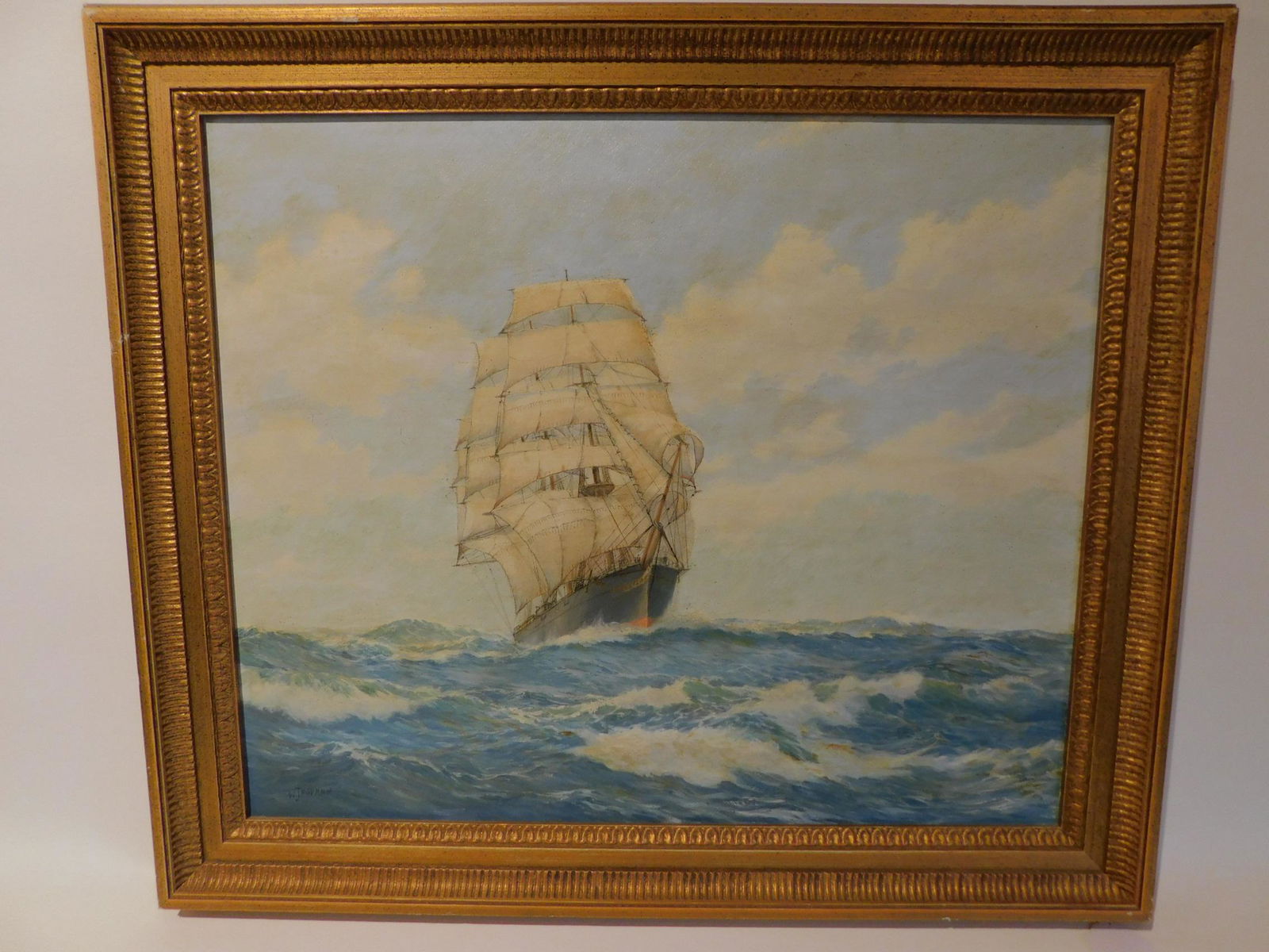 WJ POPHAM CLIPPER SHIP PAINTING: Oil on canvase of a clipper ship on open seas signed WJ Popham. 20 x 24, framed 26 x 30 inches. (Popham was a 20th C. UK marine artist)