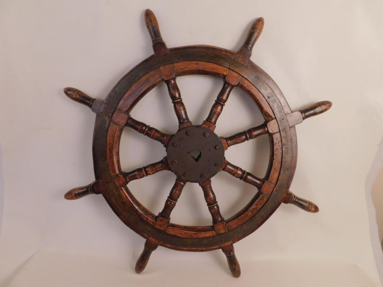 ANTIQUE WOOD & IRON SHIPS WHEEL: Antique wood and iron ships wheel, 37 in diameter.