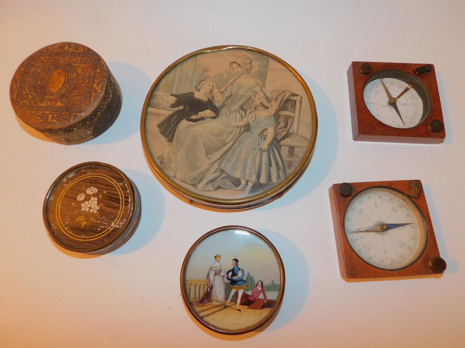 6 PIECE LOT - BOXES & 2 COMPASSES: Lot 6 estate items: 2 similar antique square wood compasses, 2.75"; 4 round boxes to 5.5 inches diameter, one reverse painted on glass.