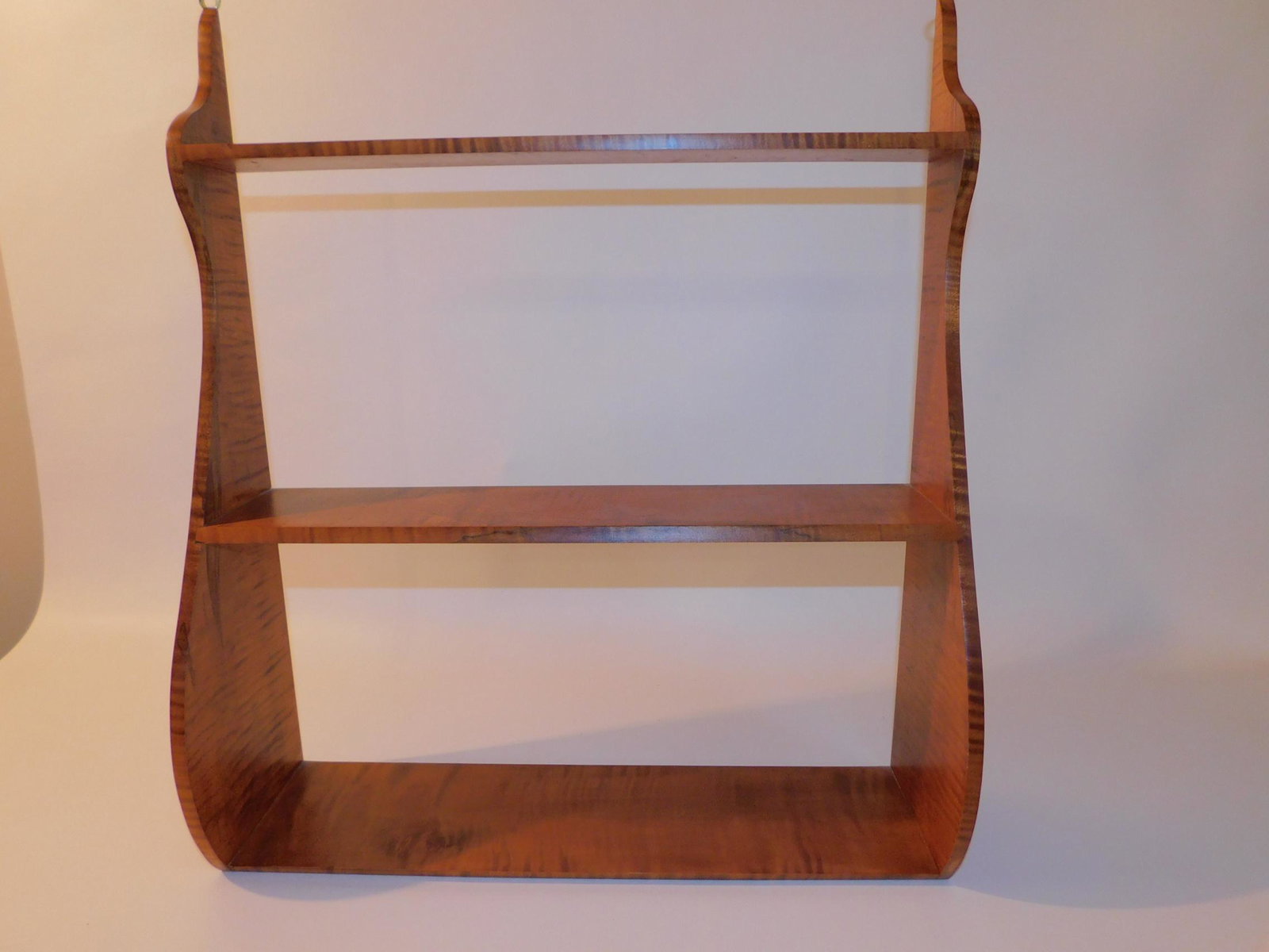 TIGER MAPLE SHELF BY MARK EMIRZIAN: Fine reproduction tiger maple 3 tier wall shelf (graduated) signed Mark Emirzian, Master Craftsman, Wilbraham, Mass. 22 x 19 x 5 in deep.