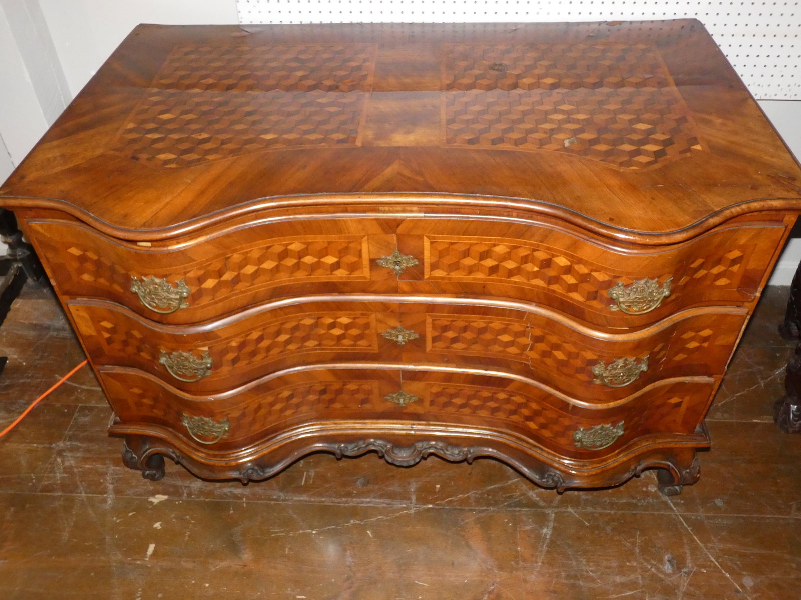 ANTIQUE MARQUETRY FRENCH CHEST: Very large 19th century French inlaid parquetry serpentine front 3 drawer chest with ormolu mounts. Has marquetry checked designs on top and front of drawers with flowering urn on sides. Size: 55 in w