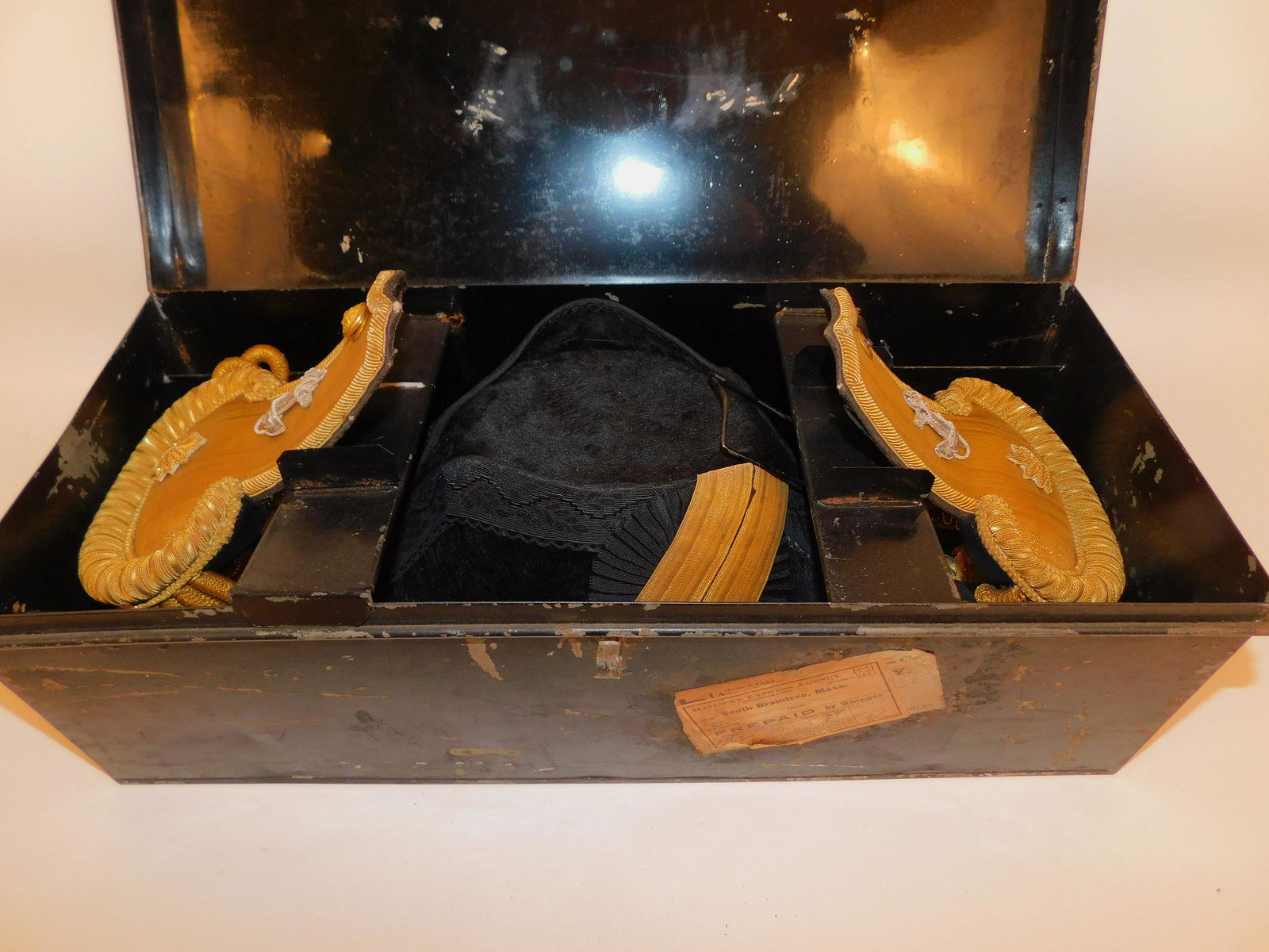 PAIR ENGLISH NAVAL EPAULETS & HAT: Pair of fine early/mid 19th century naval dress epaulets and bicorn hat in original tin box. Epaulets are stamped ENGLAND. Box is 18 in long.