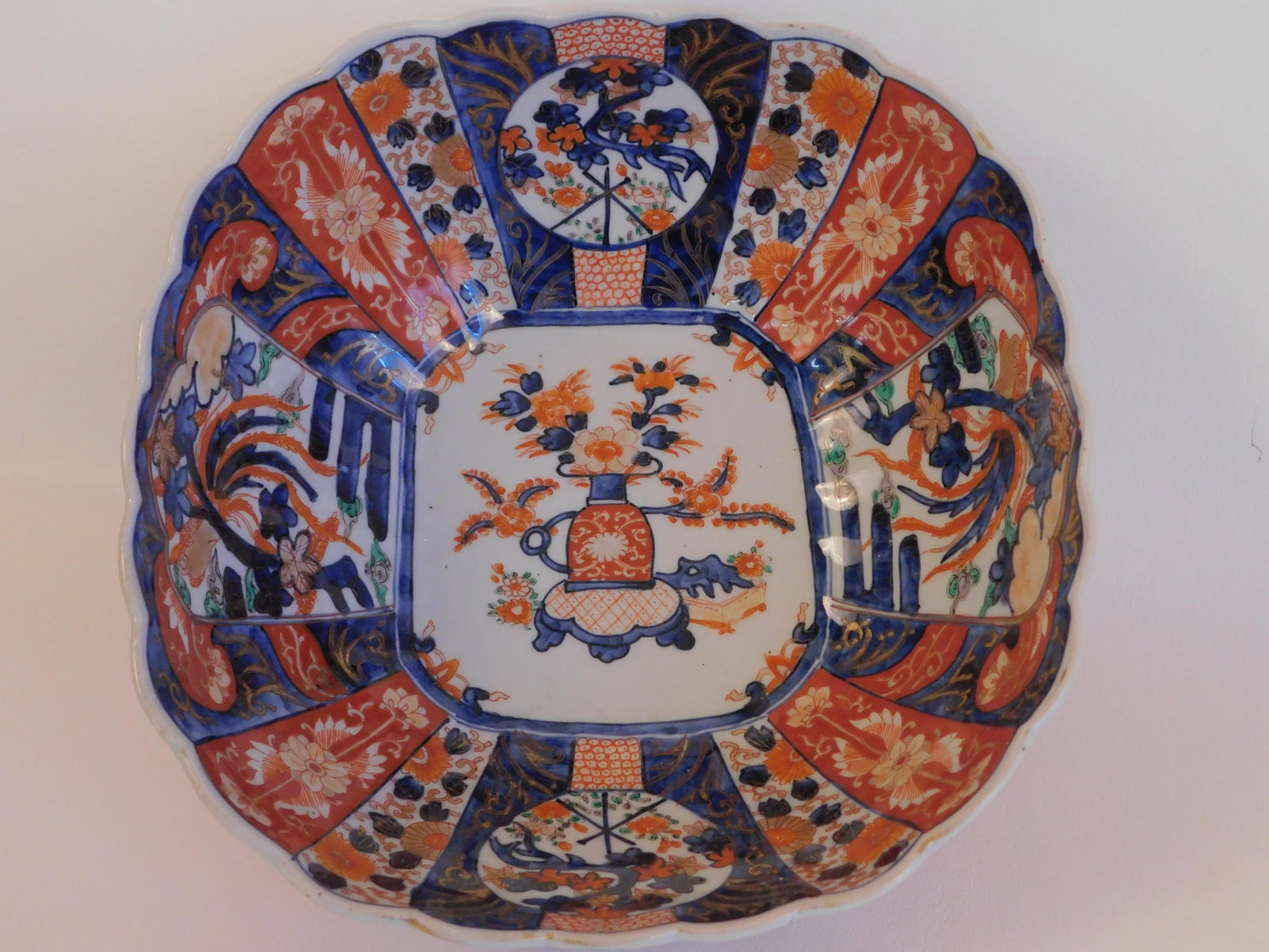 ANTIQUE JAPANESE IMARI BOWL: Antique Japanese Imari scalloped bowl with floral urn, colorful designs, etc. 10.5 x 4.75 in high. Exc condition, no marks.
