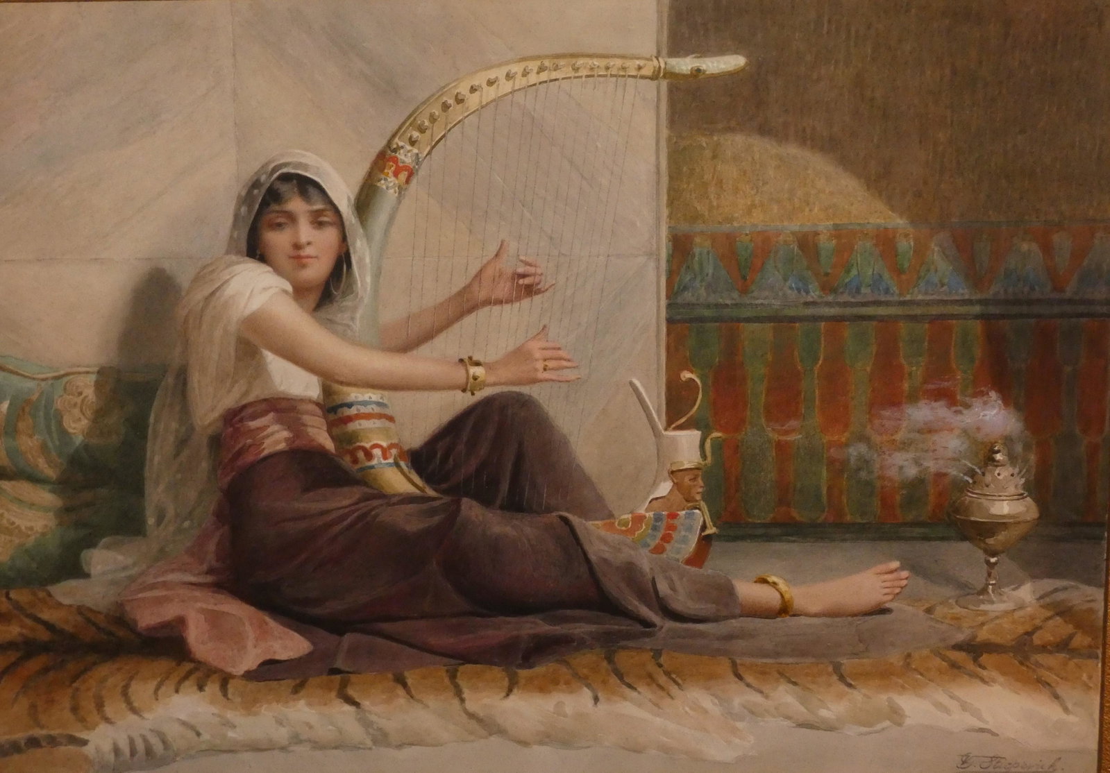 V. STIEPEVICH ORIENTALIST PAINTING: Wonderful antique watercolor painting depicting an Oriental beauty playing the harp and burning incense in a harem. Signed VG Stiepevich in lower right. 14 x 21 inches, framed 21.5 x 29.5 inches. (Vin