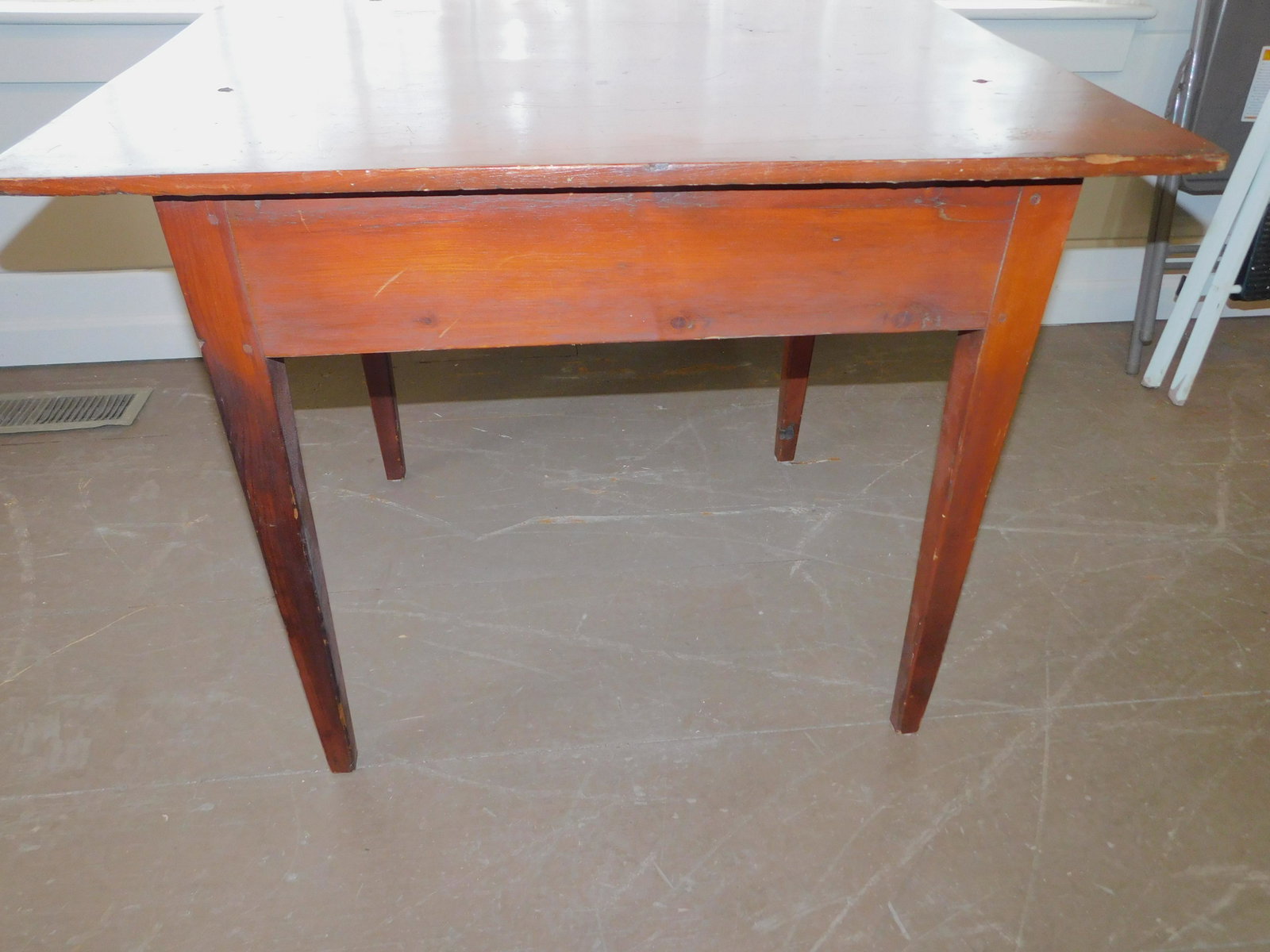 ANTIQUE PINE TABLE: Country pine antique table with square tapered legs, pegged, 27 in high, top is 34 x 27 inches.