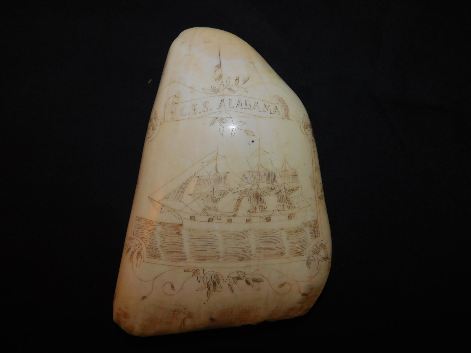 CSS ALABAMA SCRIMSHAW WHALE TOOTH: Antique whale tooth with scrimshaw CSS ALABAMA Confederate ship. 5 in x 3.5 wide, weighs 15.74 oz.