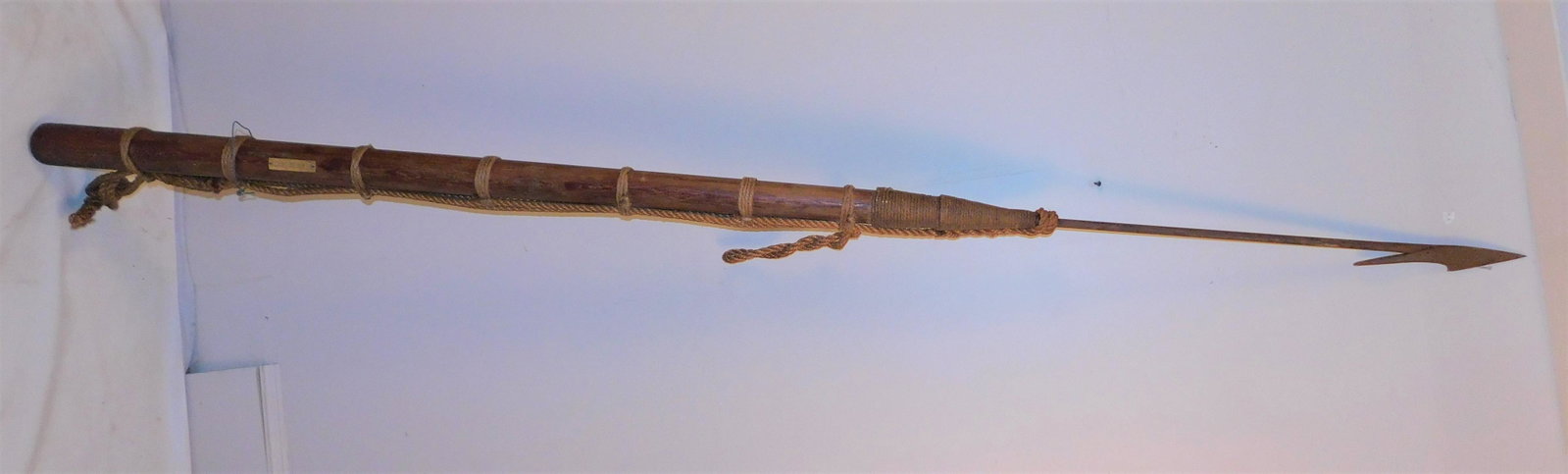 WHALING SOCIETY HARPOON: 86 inch long iron and wood harpoon with rope-wrapped handle and attached plaque NE WHALING SOCIETY.