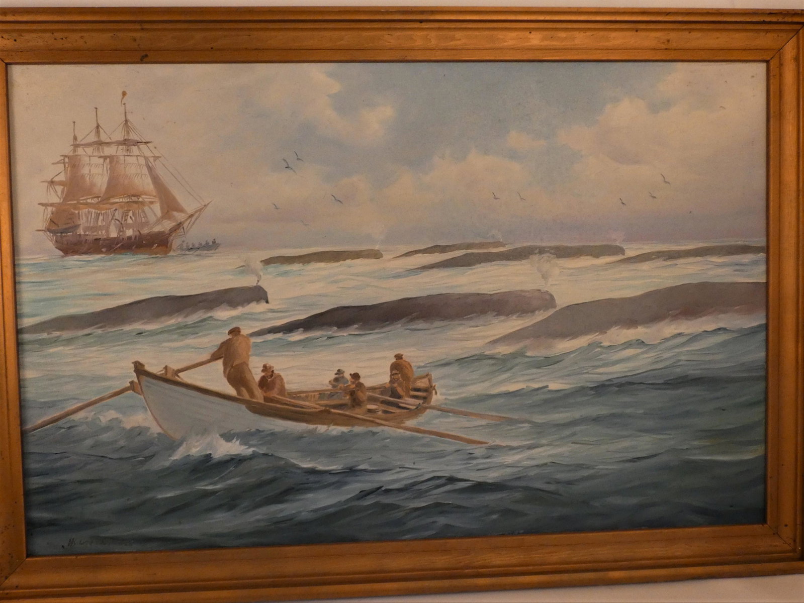 SYLVA FERNANDES WHALING PAINTING: Old oil painting on canvas depicting a pod of seven whales, whale ship and longboats signed Silva Fernandes. 30 x 46 inches, framed 35 x 51. (20th C. New Bedford MA marine artist).