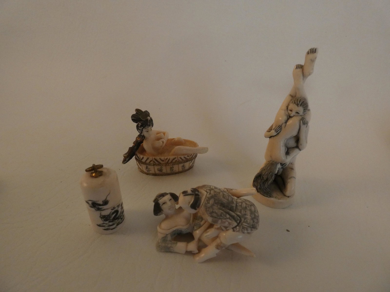 4 JAPANESE EROTIC NETSUKES: Lot 4 old Japanese erotic carved bone netsukes to 3 inches high.
