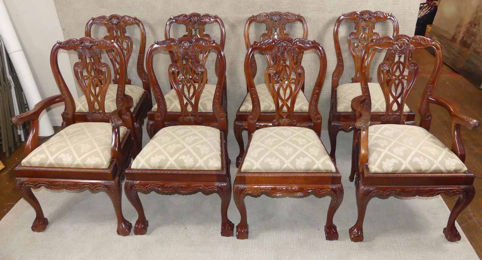 SET 8 CHIPPENDALE DINING CHAIRS BY LLOYD BUXTON: Set 8 fine carved mahogany Georgian Chippendale style dining chairs with ball and claw feet by Lloyd Buxton. Upholstered slip seats. 39.5 h x 22 w x 19 d. All in excellent condition including fabric (