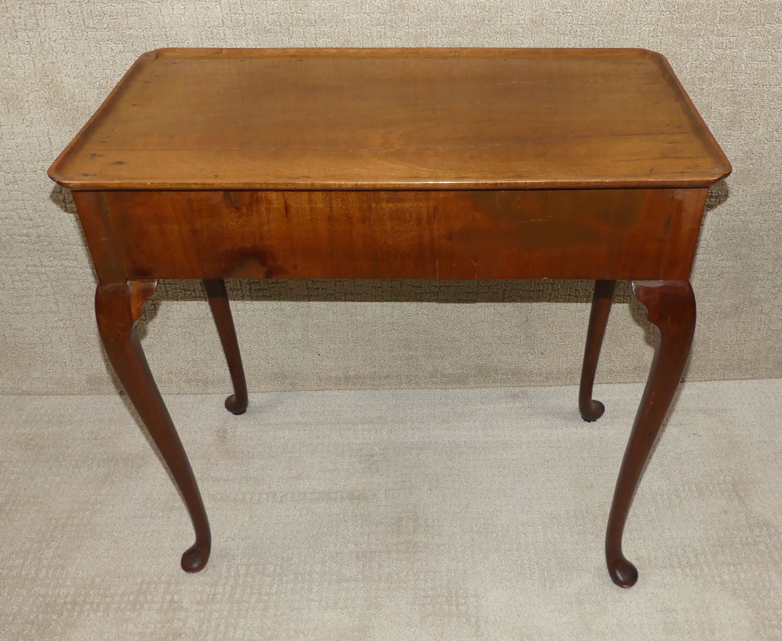 PERIOD QUEEN ANNE TEA TABLE: Period Queen Anne mahogany tea table with pad foot and tray top. 30 x 17 x 28 in high.