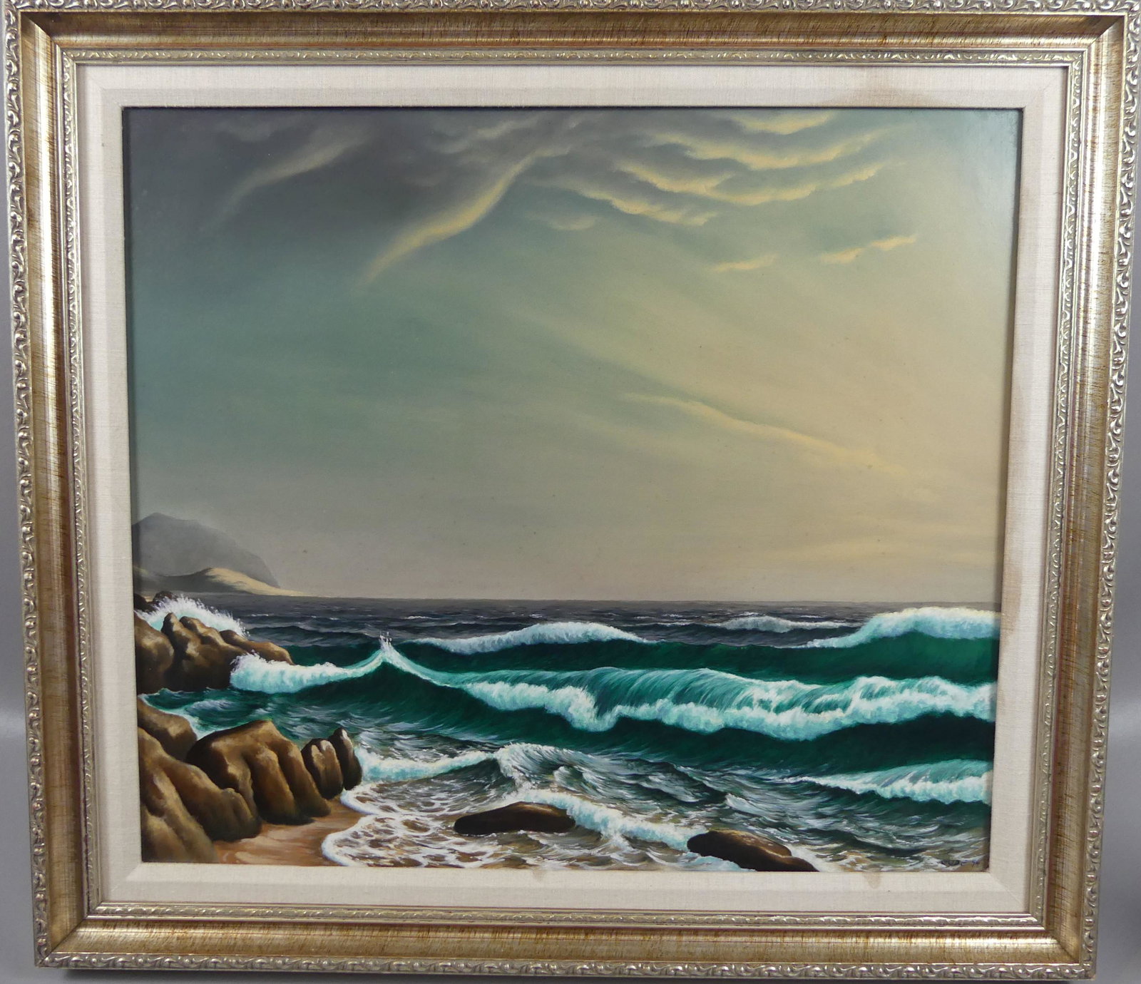 ANTHONY BENTON GUDE SEASCAPE PAINTING: Oil painting on masonite of a seascape with waves crashing on rocks signed GUDE '94. 21 x 24 inches, framed 26 x 29. (Anthony Benton Gude is a Kansas and Missouri regionalist painter born 1963. He is 