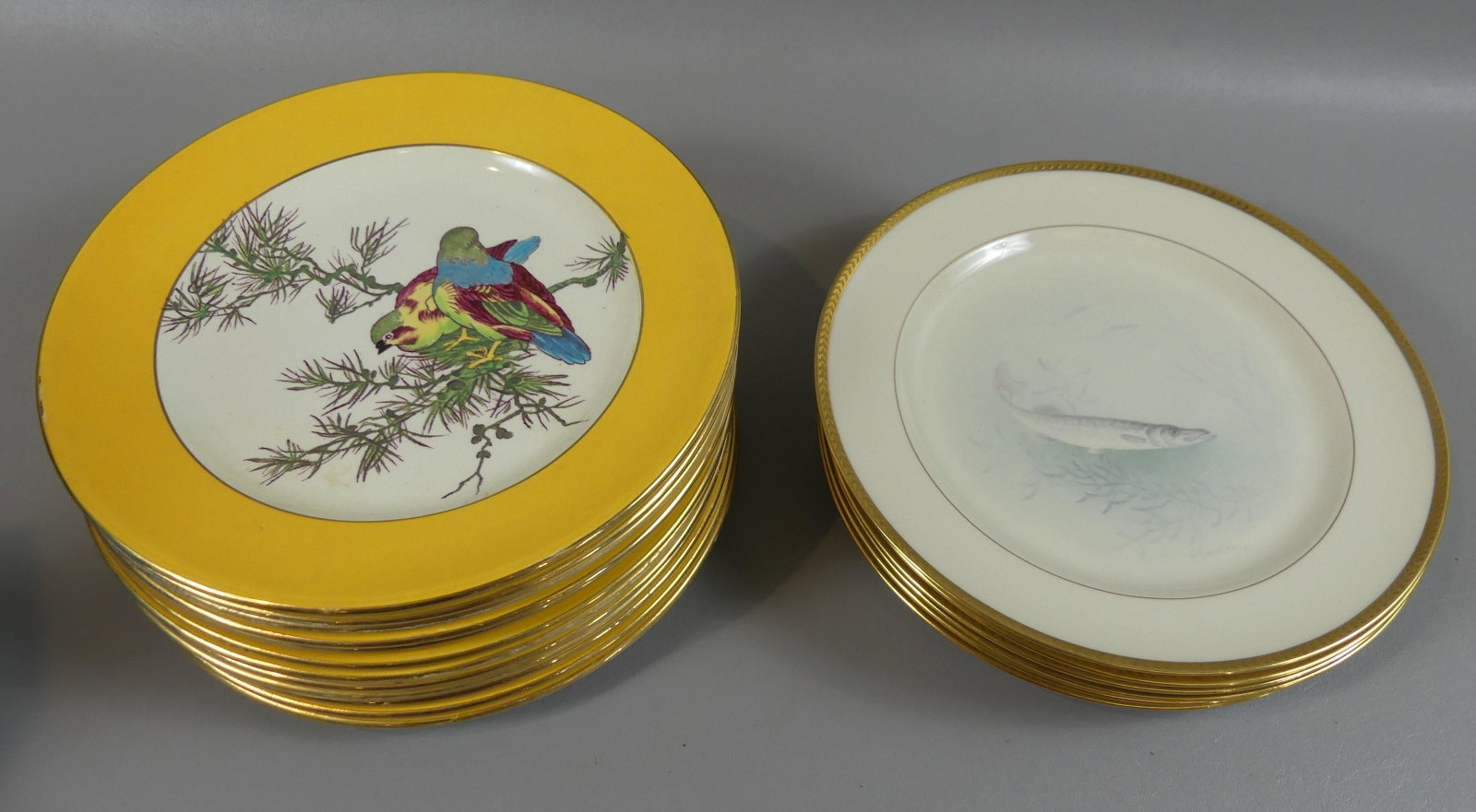 LENOX FISH & WEDGWOOD BIRD PLATES: 2 sets of 9 inch plates: fine porcelain hand painted set of 6 plates with various fish signed Tiffany & Co and Lenox 8/E25-B (all fine condition); and set 12 Wedgwood Etruria ceramic plates with color