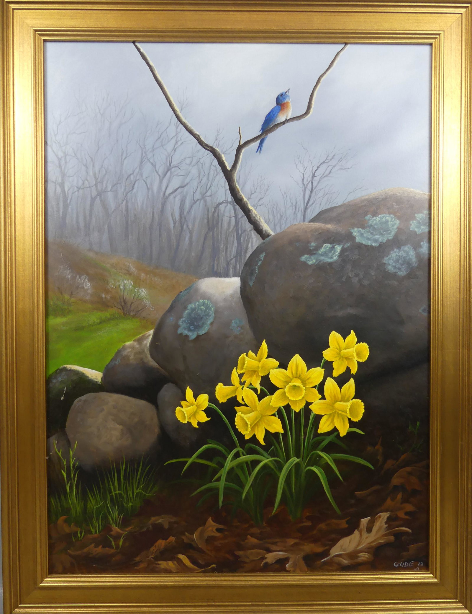ANTHONY BENTON GUDE STILL LIFE PAINTING: Oil painting on masonite of a landscape with Eastern blue bird over rocks and daffodils signed GUDE 13. Size: 25 x 18 inches, framed 29 x 22. (Anthony Benton Gude is a Kansas and Missouri regionalist 