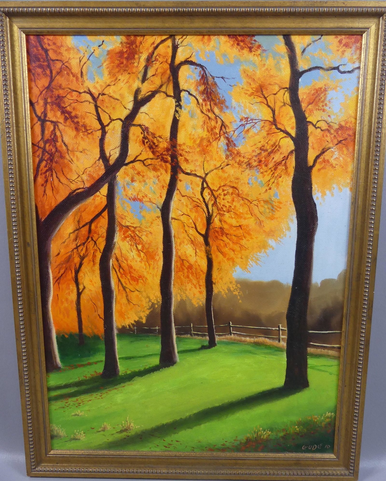 ANTHONY BENTON GUDE PAINTING OF TREES: Oil painting on masonite of a landscape with stand of colorful trees signed GUDE '10 and titled verso BEETLEBUNG STUDY. Size: 22 x 16, framed 24 x 18 inches. (Anthony Benton Gude is a Kansas and Misso