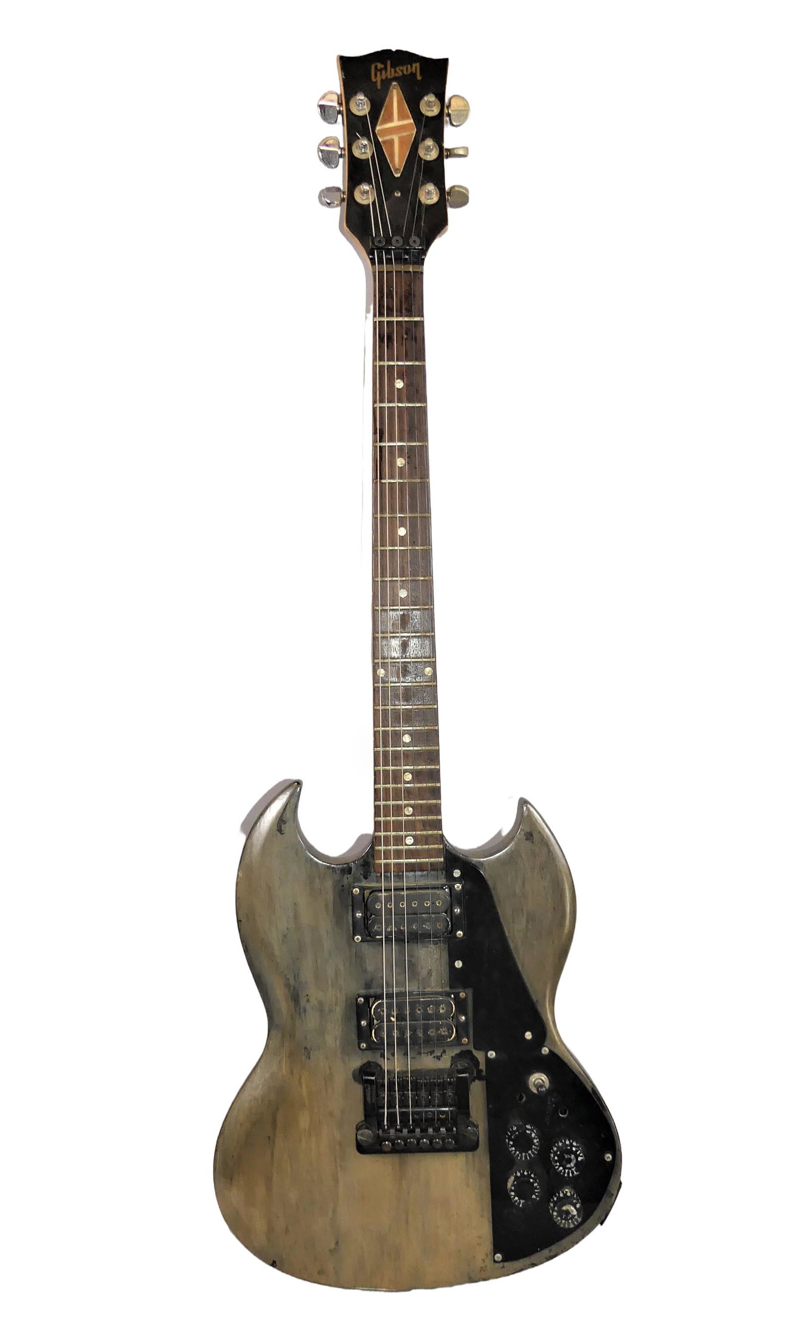 OLD GIBSON ELECTRIC GUITAR: Old Gibson solid wood body electric guitar, Made in USA serial number 62189(?). Has later painted or stained body and sticker on back. 39 in long, 6 strings. Grover tuners. In home made plywood case.