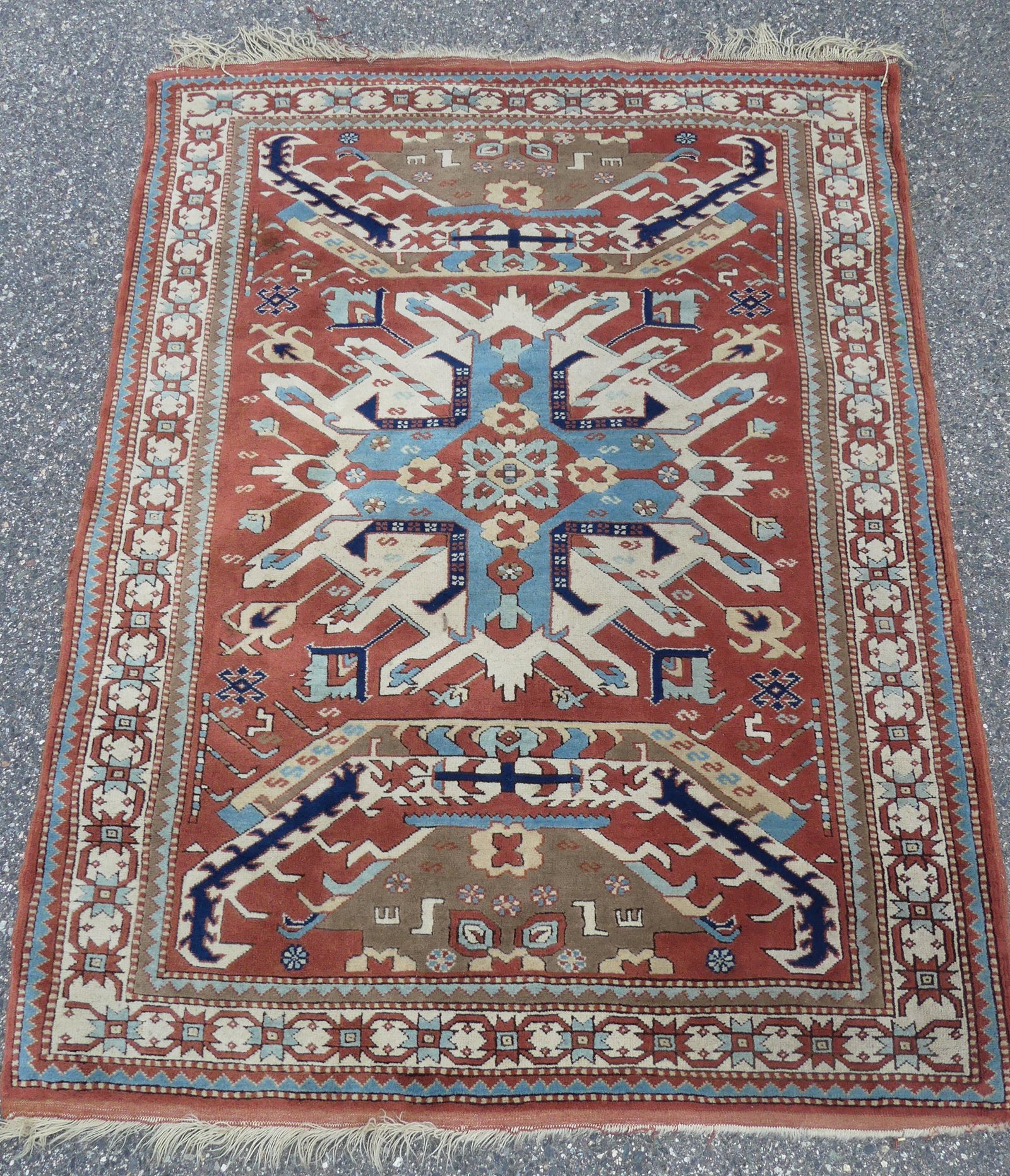 KAZAK SCATTER RUG: Vintage Kazak scatter rug in rust, cream and blue colors, 5 ft 8 by 4 ft 3 inches. VG condition