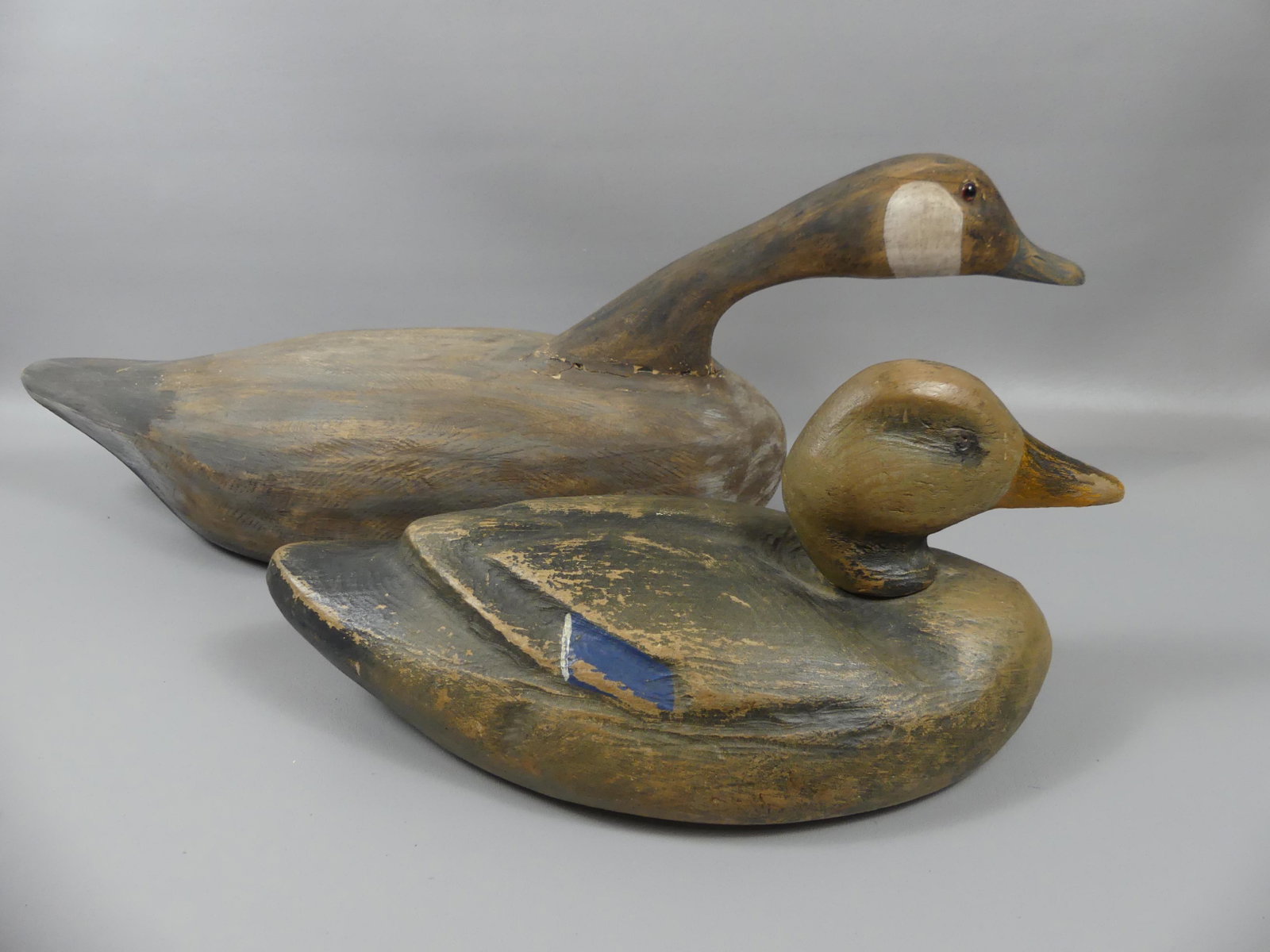 2 OLD WOOD DECOYS, 1 BY F. CONANT: Lot 2 old carved and painted wood decoys - 29 in goose with craned neck and glass eyes; and 16 in duck signed F. CONANT.