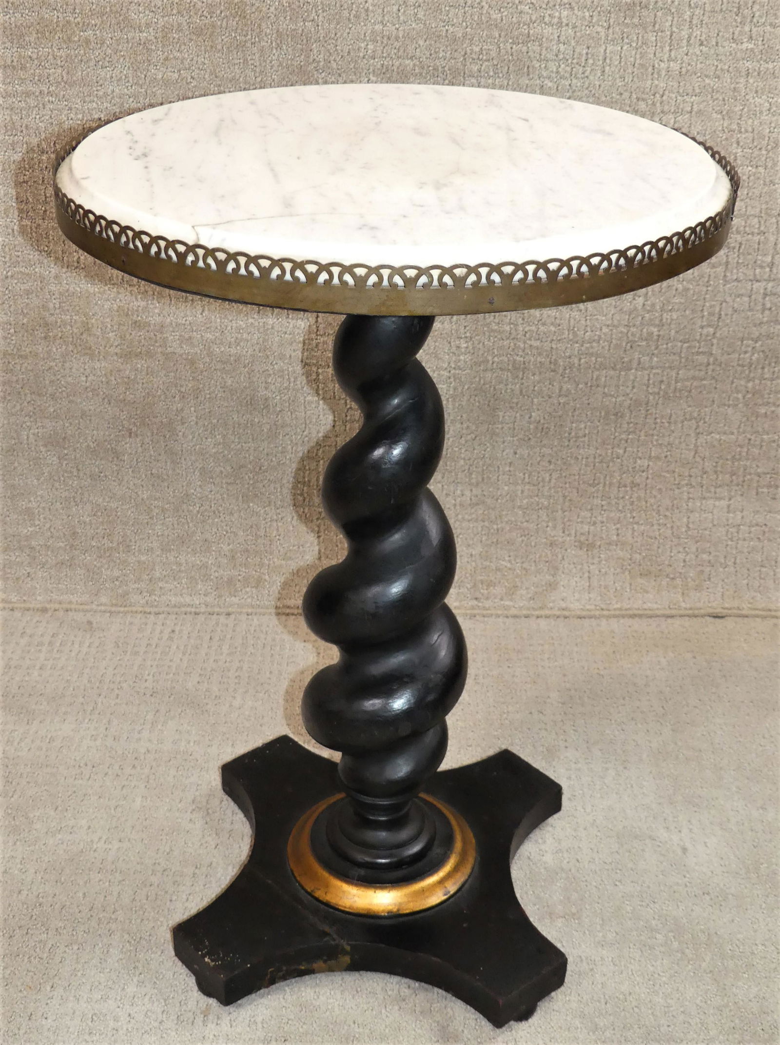 MARBLE TOP TWIST COLUMN TABLE: Antique ebonized wood stand or small table with white marble top and twist column. Base has repair and marble has a partial (stable) crack. 20 in round, 30 high.