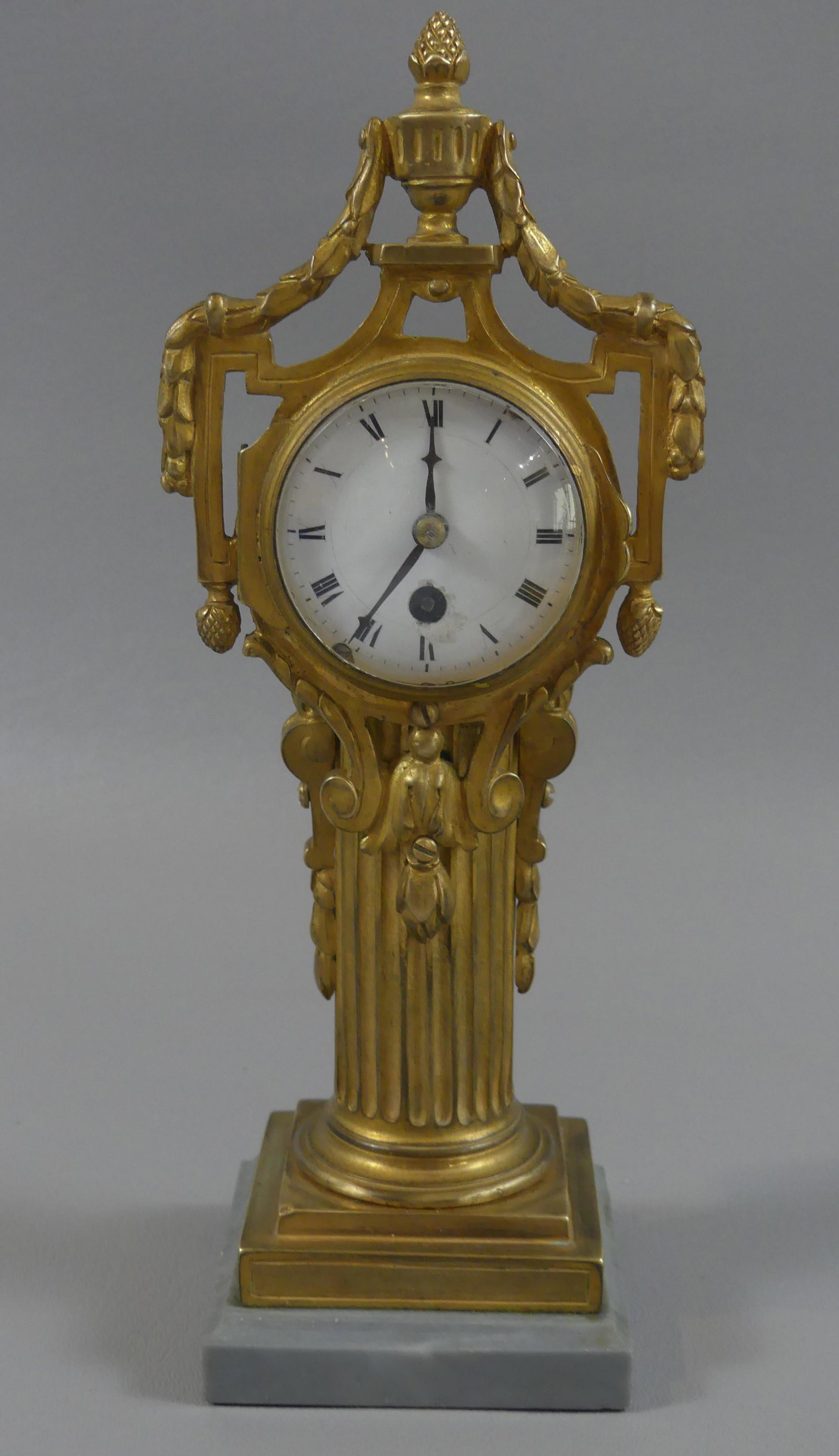 FRENCH BRASS DESK CLOCK: Antique bronze desk clock signed L. Leroy & Co. Paris #49949. 10 in tall x 3 in square marble base. Has key and is currently running.