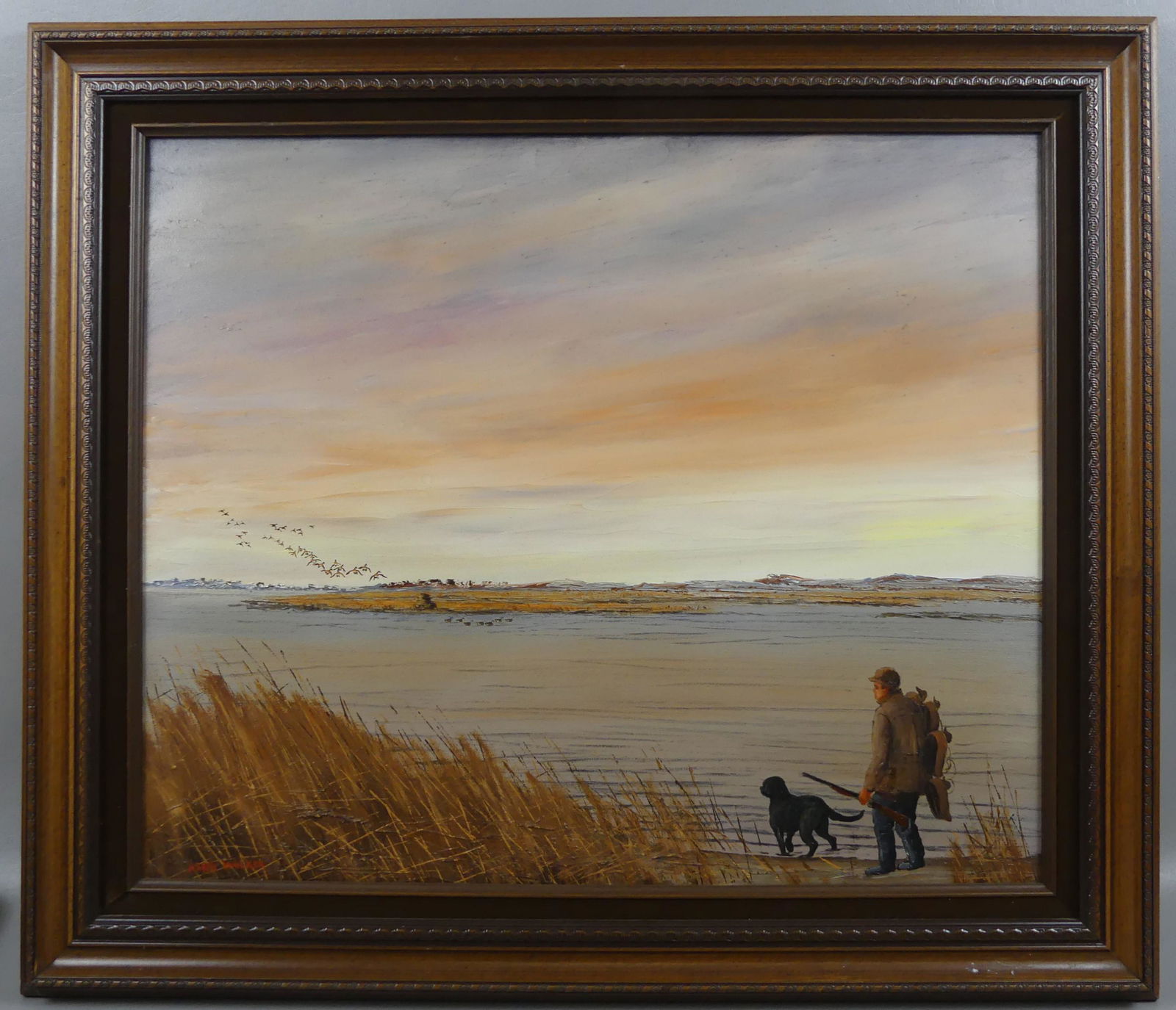 HANK WALKER PAINTING GOOSE HUNT SCENE: Oil painting of a luminist marshy landscape with flock of geese and hunter with rifle and dog signed Hank Walker. 20 x24 inches, framed 25 x 29. (Henry Hank Walker 1919-1995 was a Newburport MA sporti
