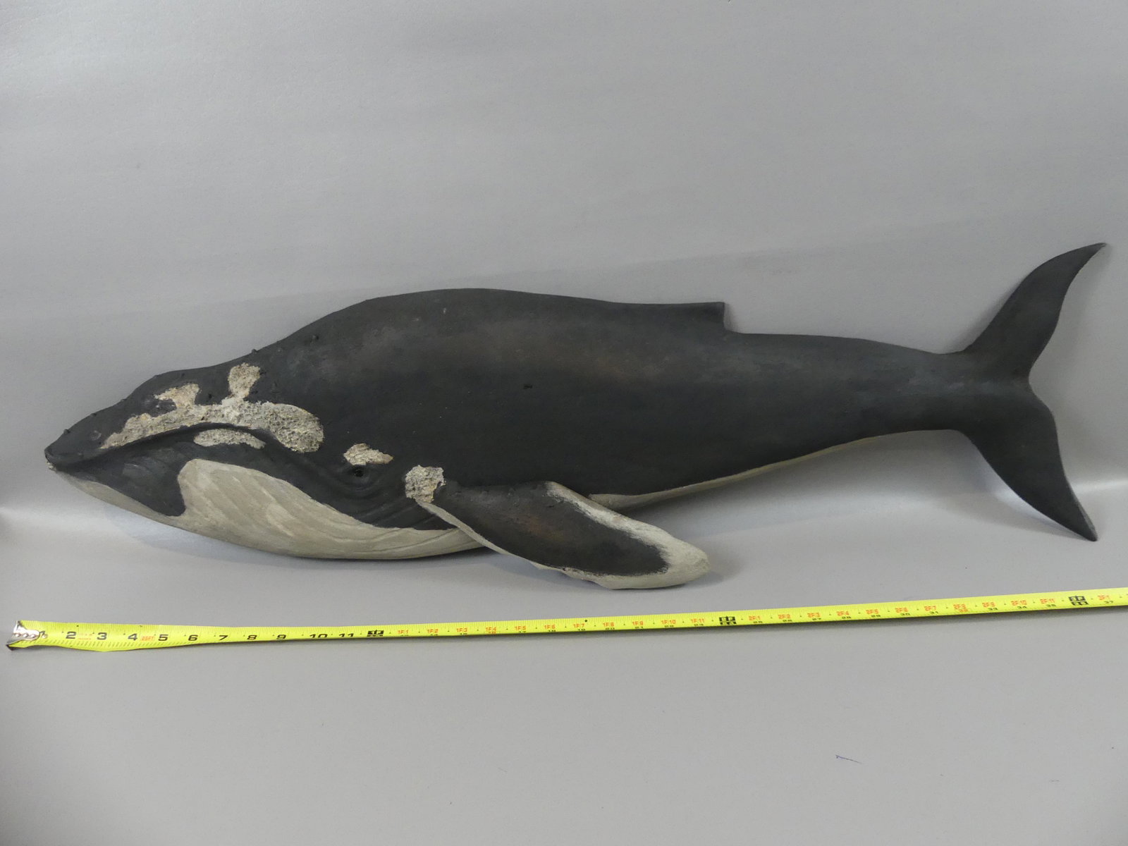 KEN BECKENHAUPT HUMPBACK WHALE PLAQUE -39 INCH LONG: Carved and painted wood Humpback Whale plaque signed Ken Beckenhaupt, Cape Cod. 39 in long and 11 high.