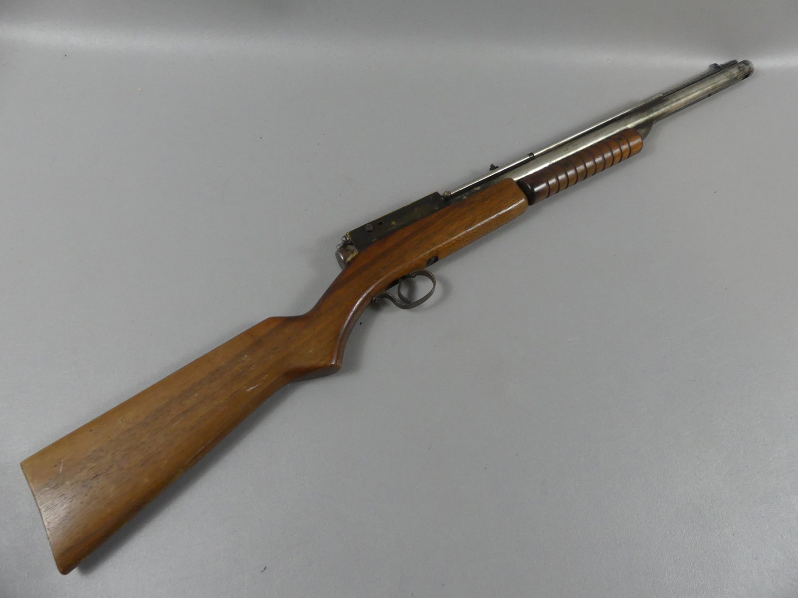 BEN FRANKLIN PELLET RIFLE: Old child's pump action pellet rifle stamped BENJAMIN FRANKLIN. 35 in long.